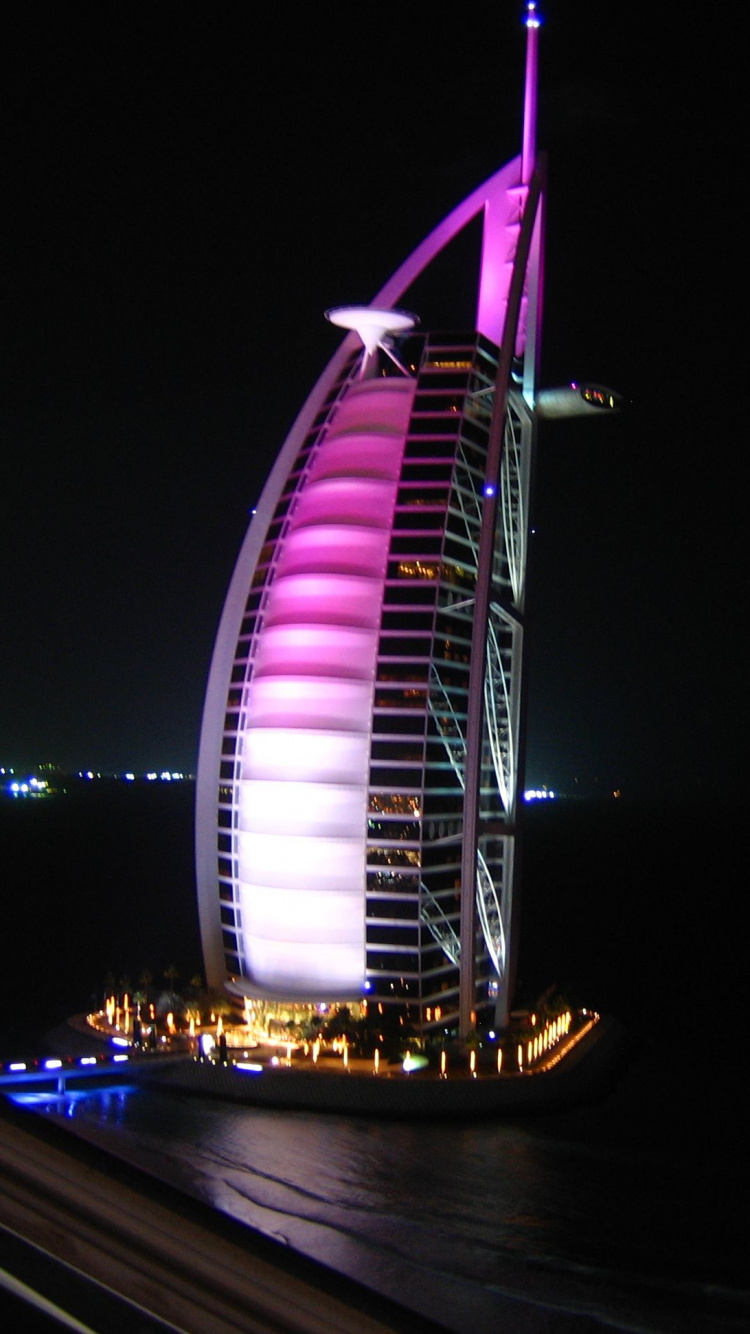 White and Purple Ferris Wheel During Night Time. Wallpaper in 750x1334 Resolution
