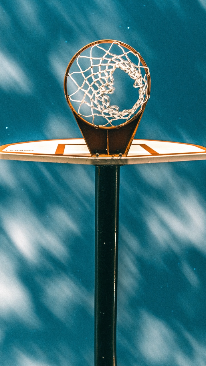 White and Black Basketball Hoop Under Blue Sky. Wallpaper in 720x1280 Resolution