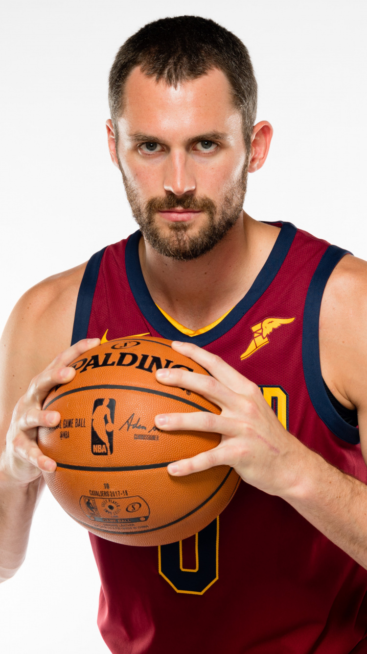 Man in Red and Blue Tank Top Holding Basketball. Wallpaper in 750x1334 Resolution