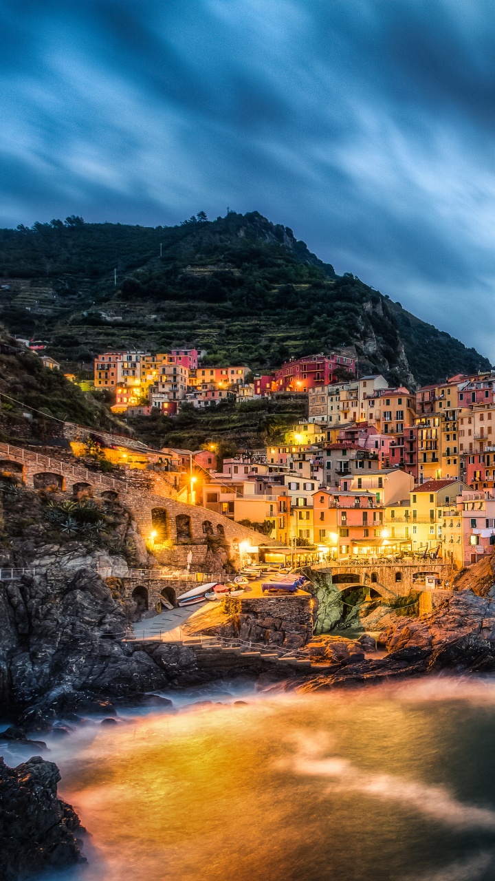 Brown and Green Mountain Beside Body of Water Under Cloudy Sky During Daytime. Wallpaper in 720x1280 Resolution