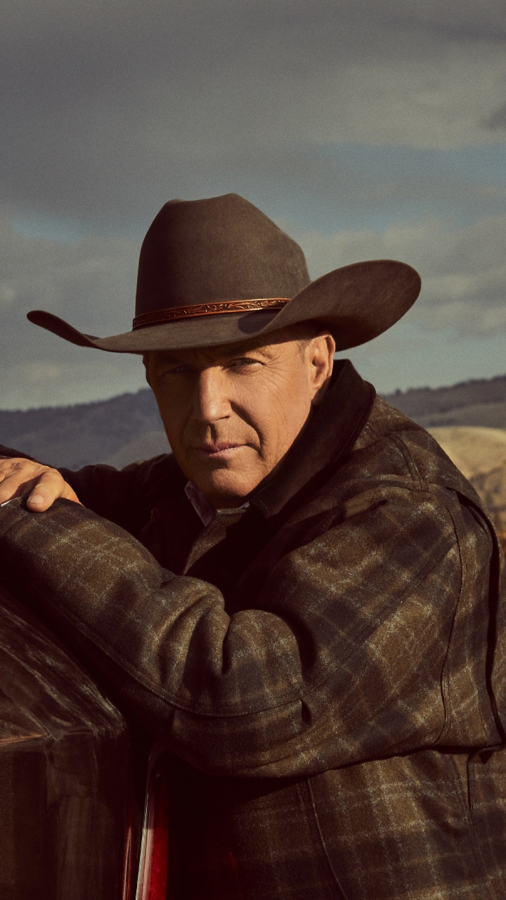 Man in Brown Cowboy Hat and Plaid Dress Shirt Sitting on Brown Wooden Bench. Wallpaper in 720x1280 Resolution