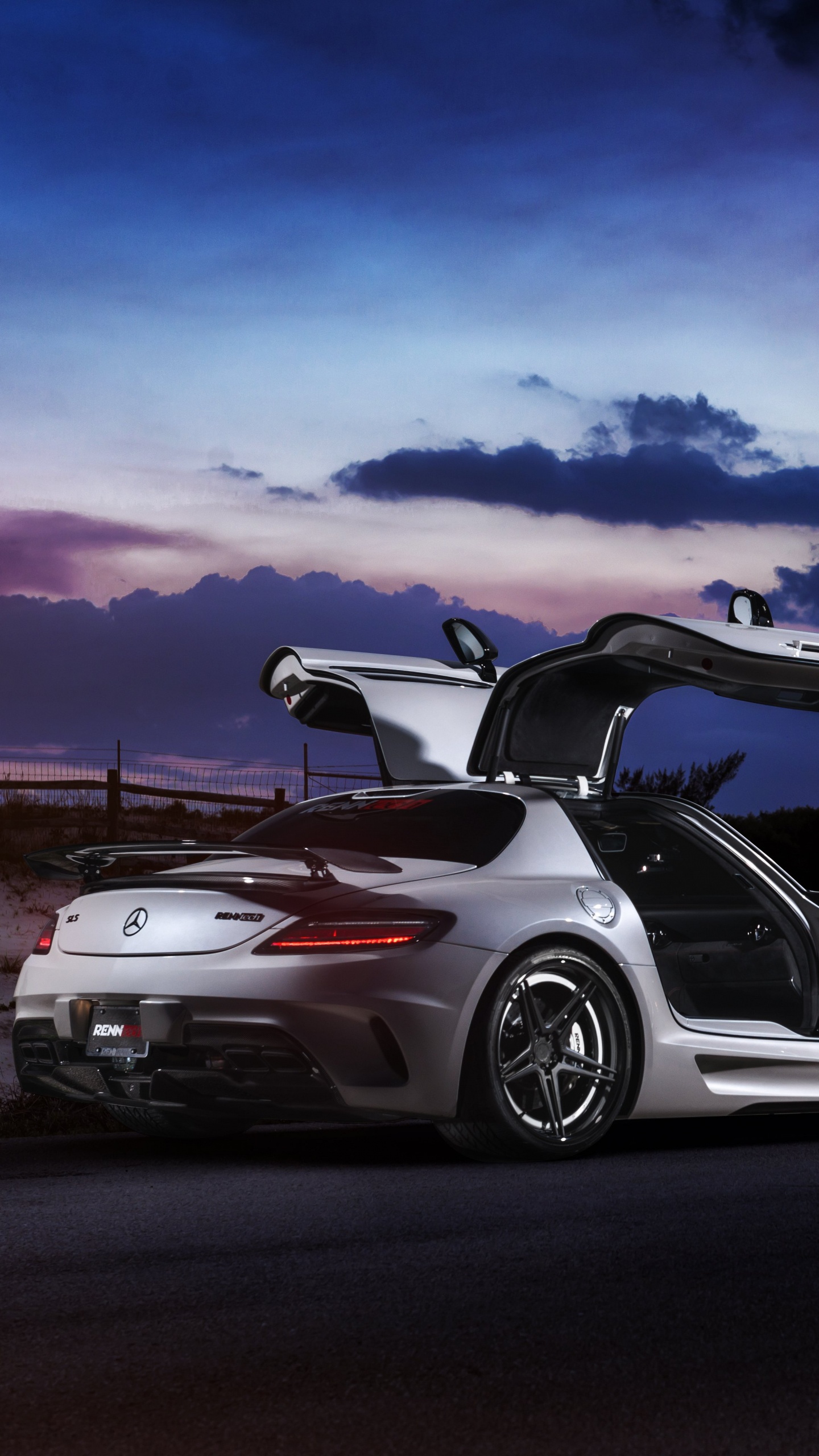 White and Black Porsche 911 on Road Under Blue Sky. Wallpaper in 1440x2560 Resolution