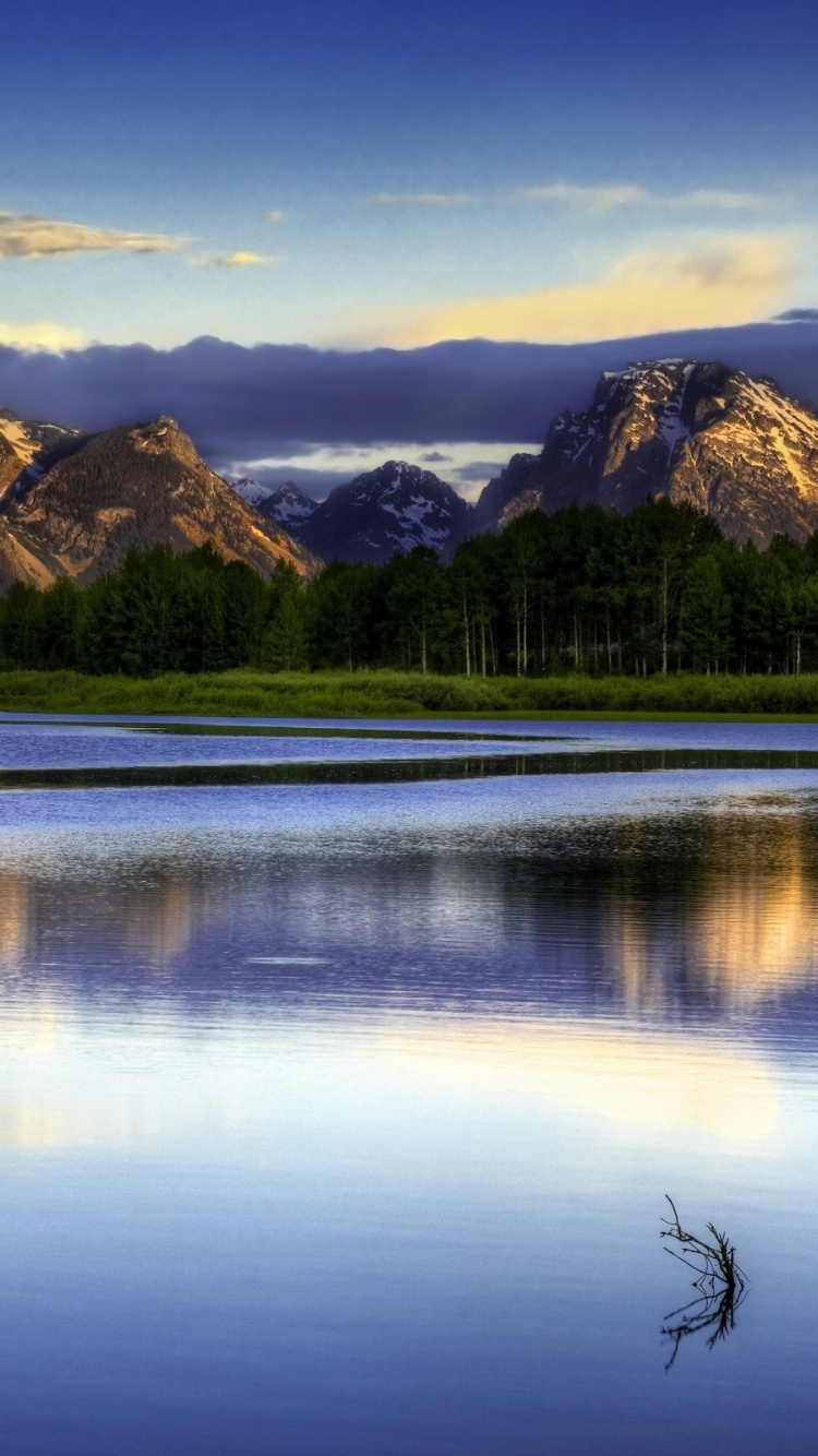 Lake Near Green Trees and Mountain Under Blue Sky During Daytime. Wallpaper in 750x1334 Resolution