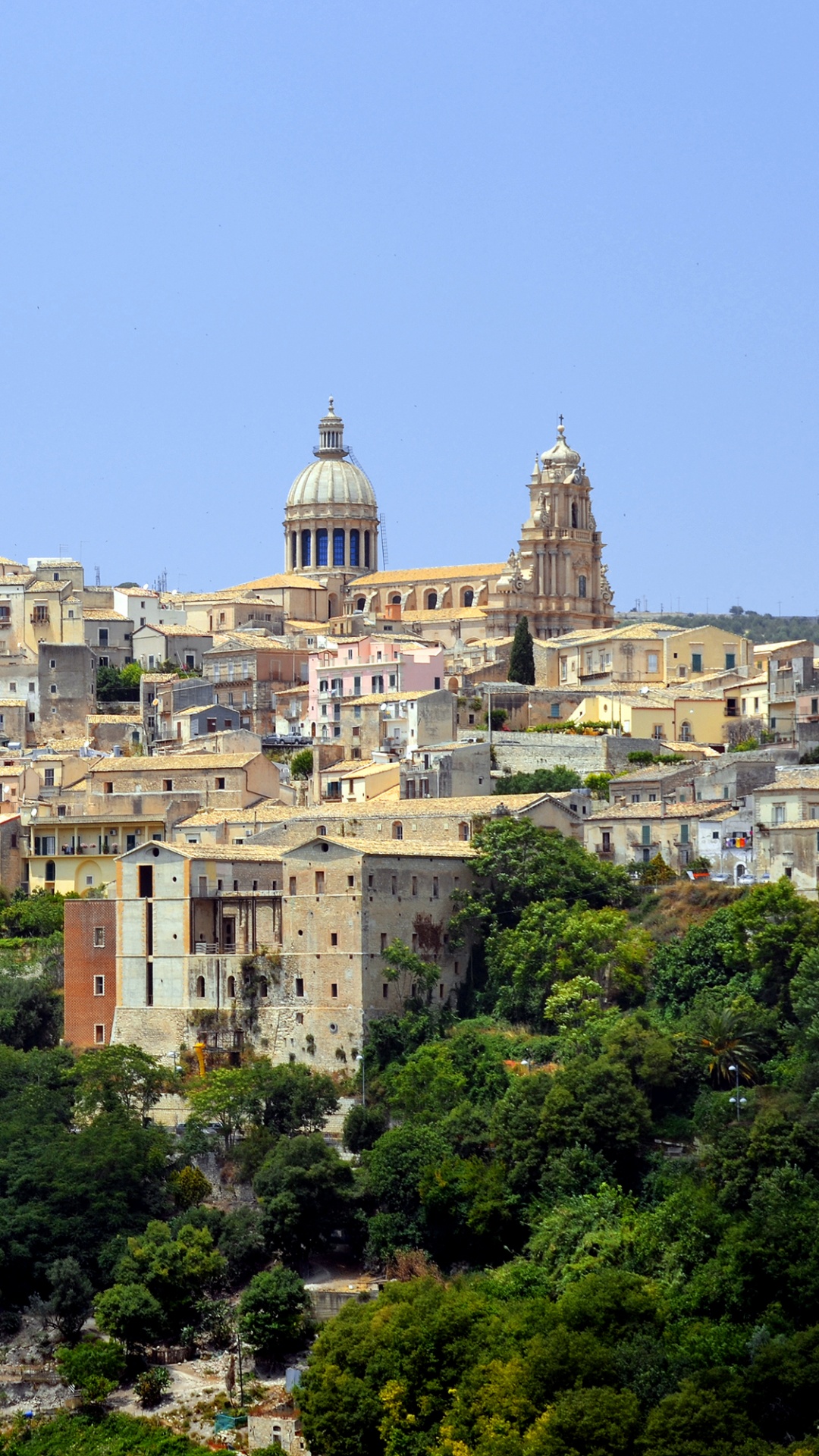 Brown and White Concrete Buildings on Mountain. Wallpaper in 1080x1920 Resolution