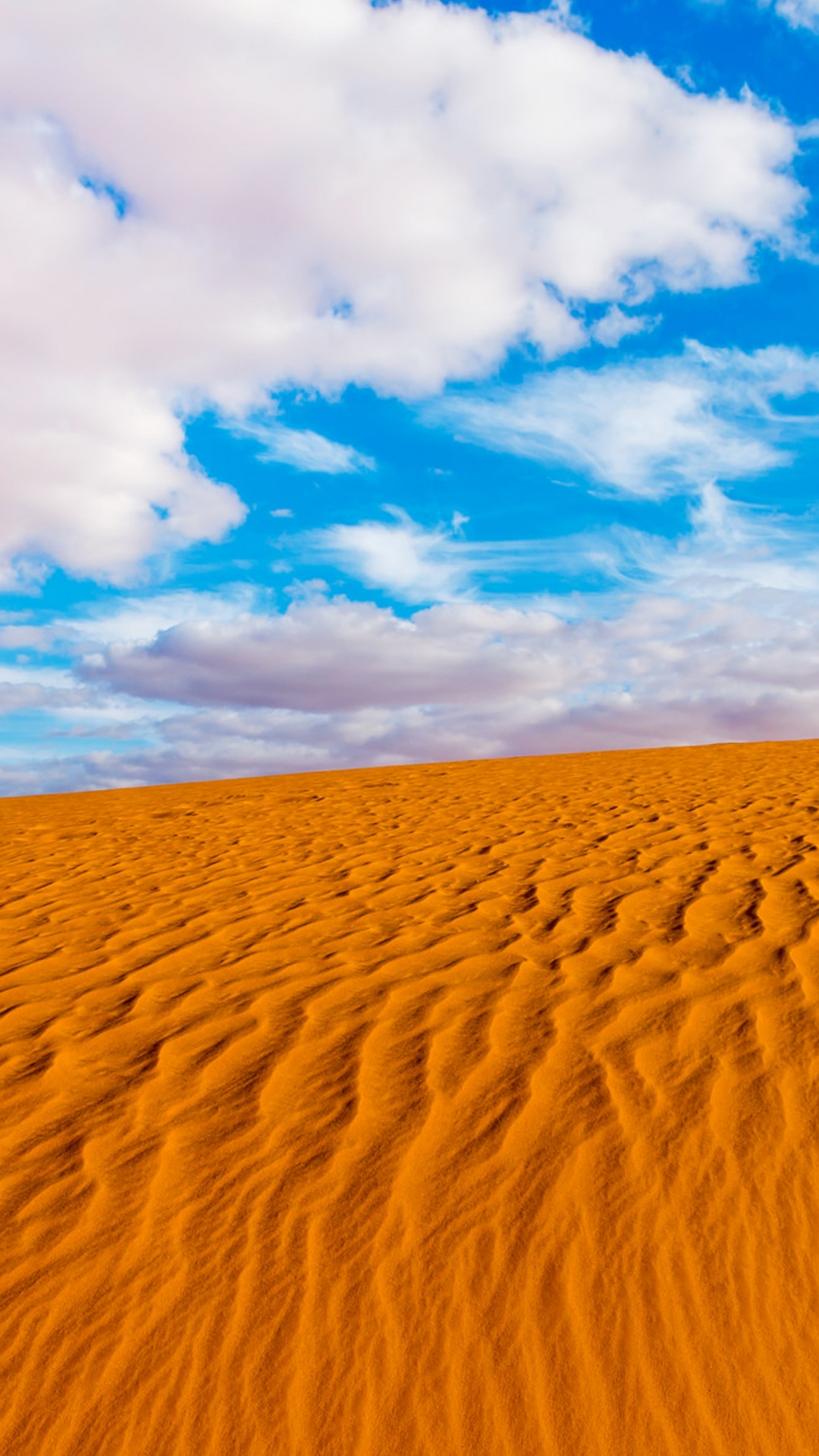 Brown Sand Under Blue Sky During Daytime. Wallpaper in 1080x1920 Resolution