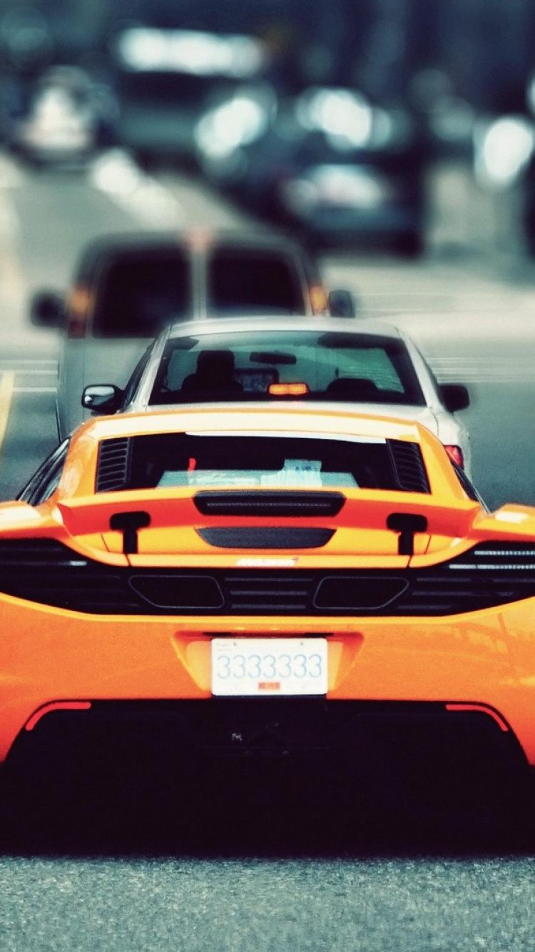 Lamborghini Aventador Orange Sur Route Pendant la Journée. Wallpaper in 750x1334 Resolution