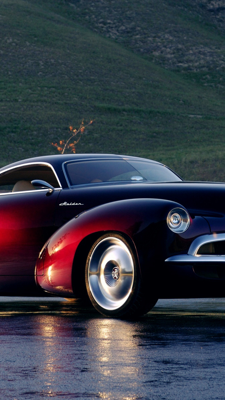 Red Coupe on Road During Daytime. Wallpaper in 750x1334 Resolution