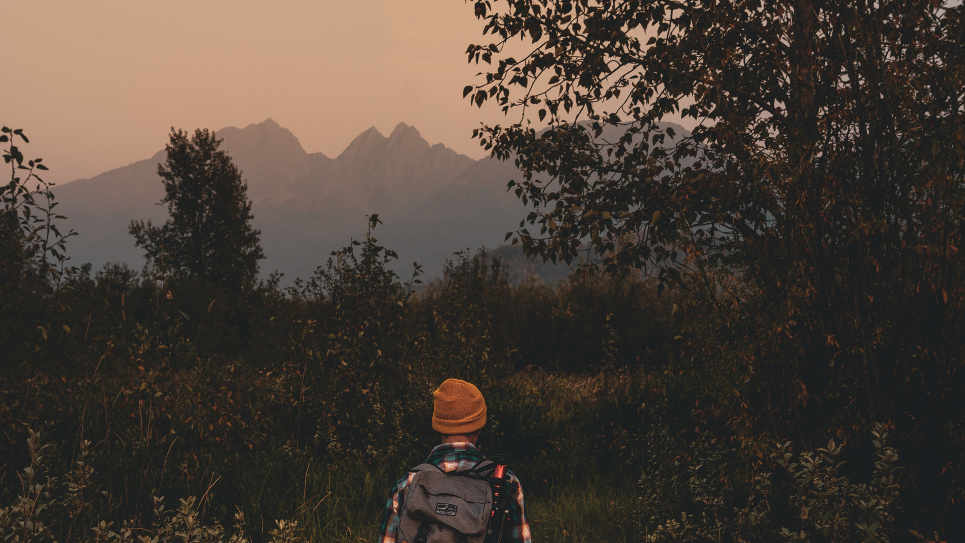 Man in Brown Hat Standing on Green Grass Field During Daytime. Wallpaper in 1920x1080 Resolution