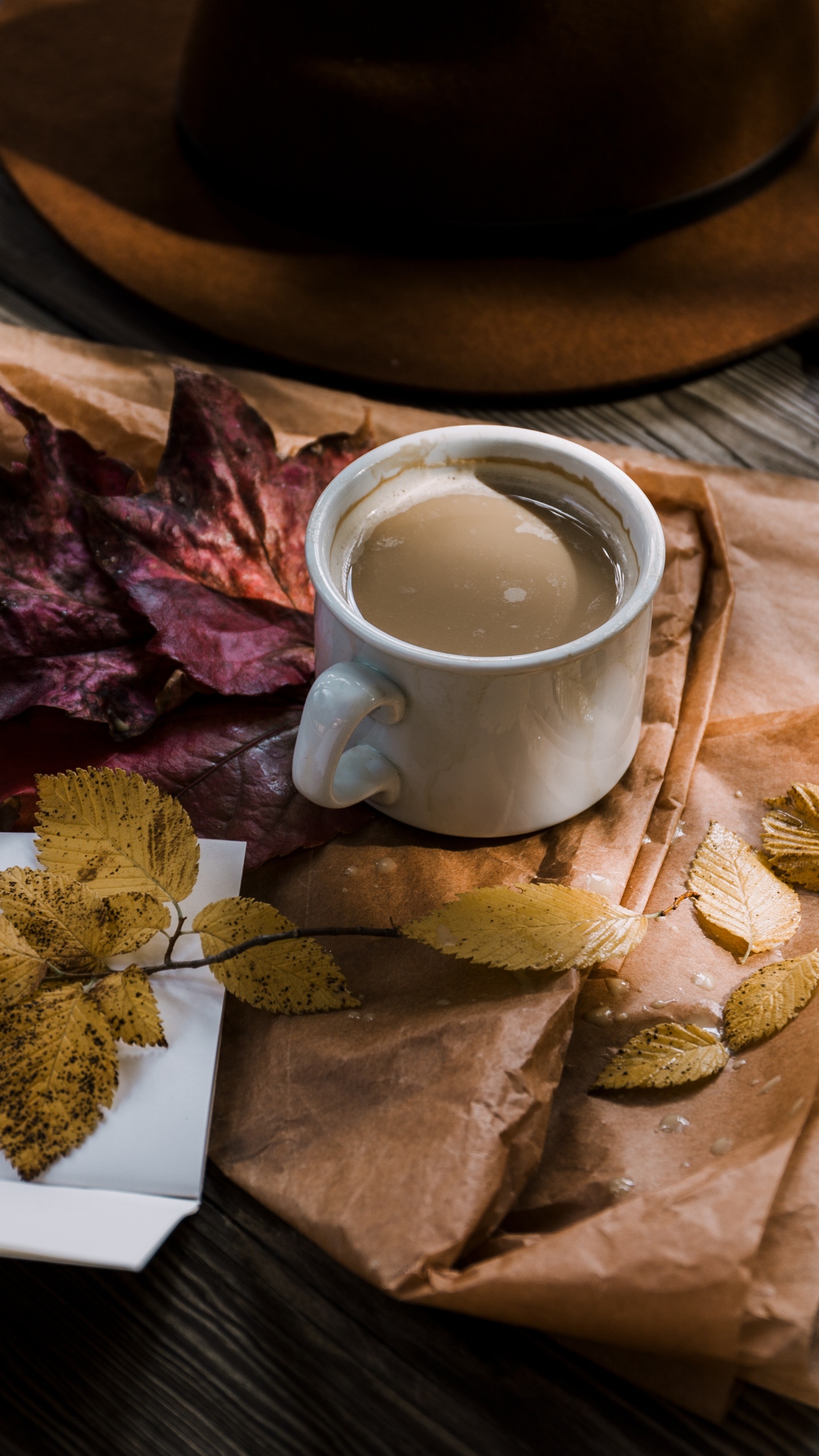 White Ceramic Mug on Brown Wooden Coaster. Wallpaper in 1440x2560 Resolution