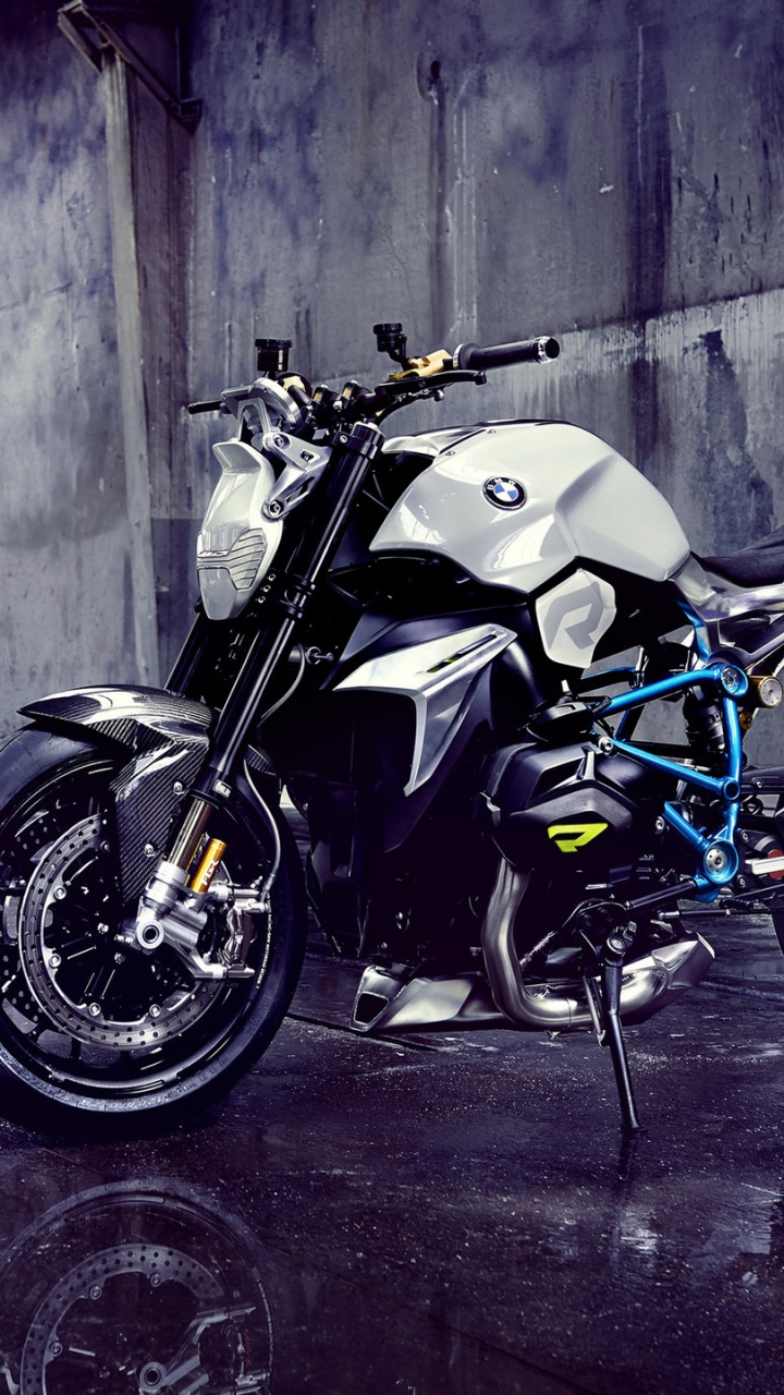 Black and Silver Cruiser Motorcycle Parked Beside Wooden Wall. Wallpaper in 720x1280 Resolution