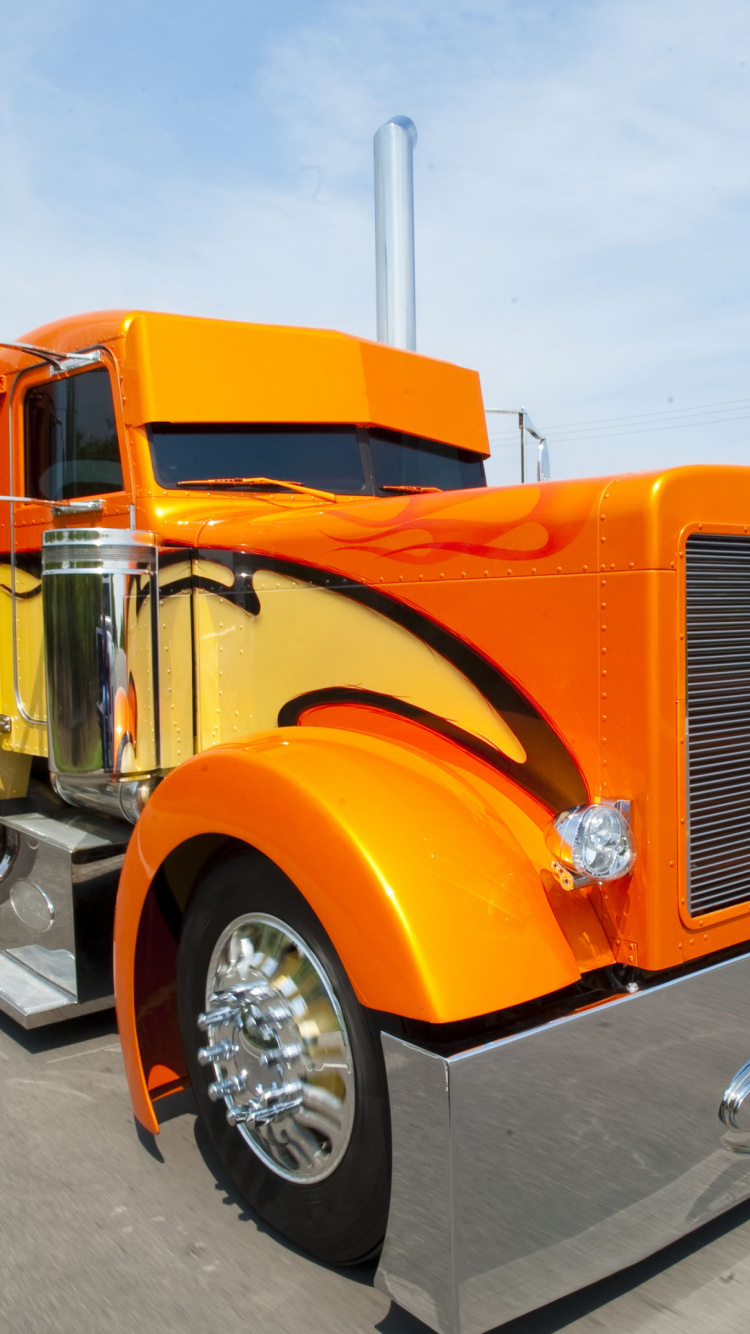 Orange Truck on Gray Asphalt Road During Daytime. Wallpaper in 750x1334 Resolution