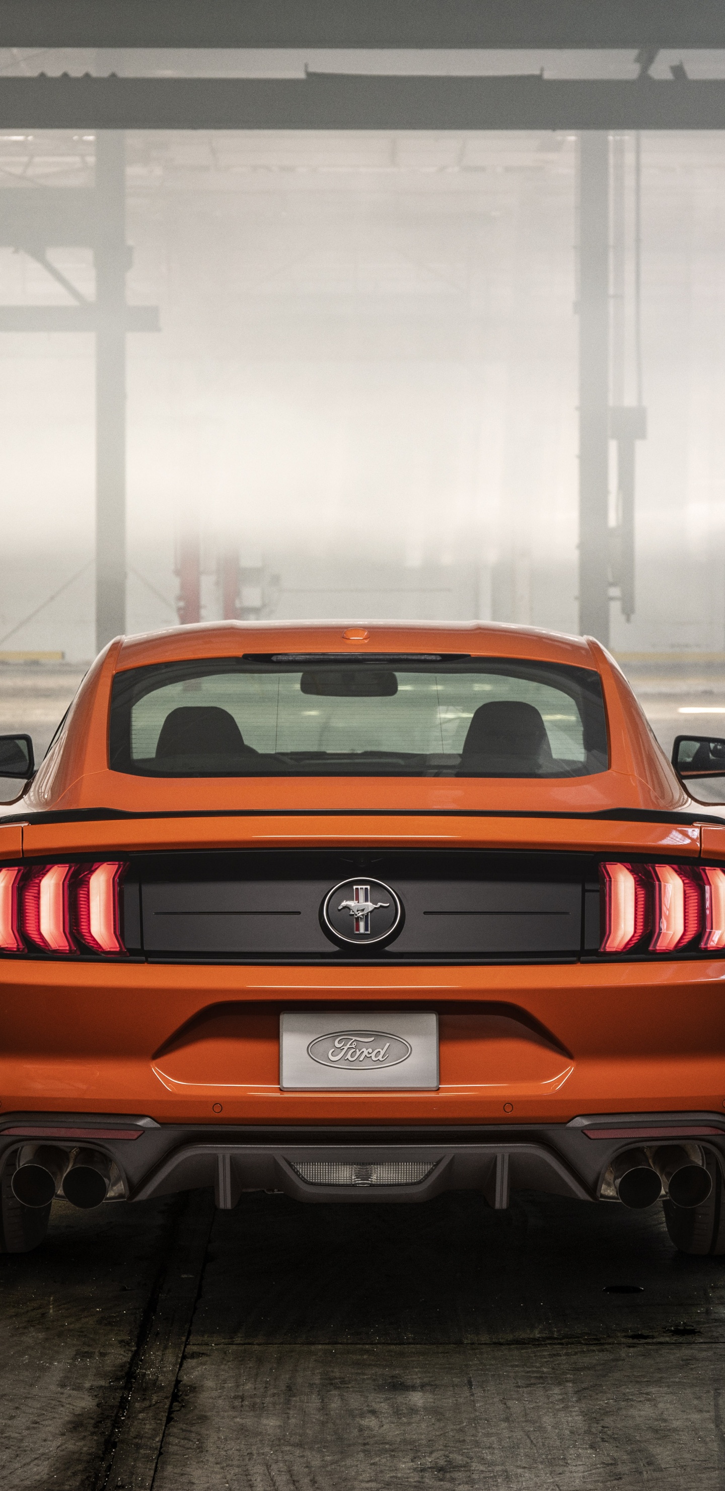 Red Chevrolet Camaro in a Parking Lot. Wallpaper in 1440x2960 Resolution