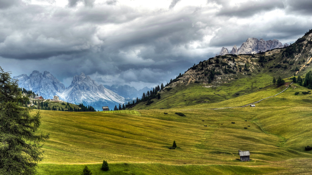 Green Grass Field Under Cloudy Sky During Daytime. Wallpaper in 1280x720 Resolution