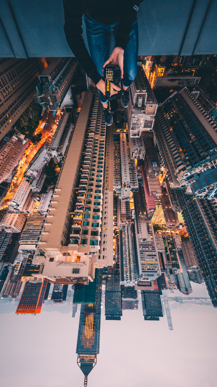 Vue Aérienne Des Bâtiments de la Ville Pendant la Journée. Wallpaper in 750x1334 Resolution