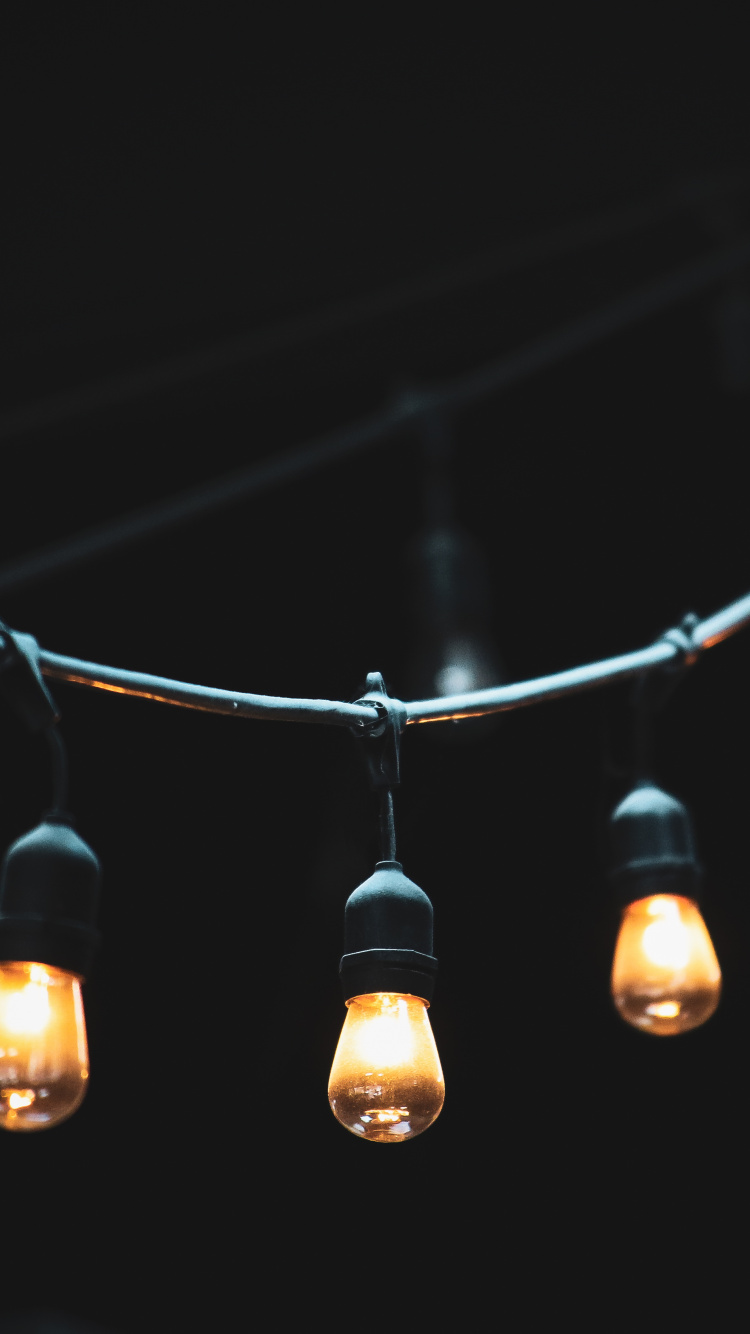 Bombilla de Luz Negra y Marrón. Wallpaper in 750x1334 Resolution