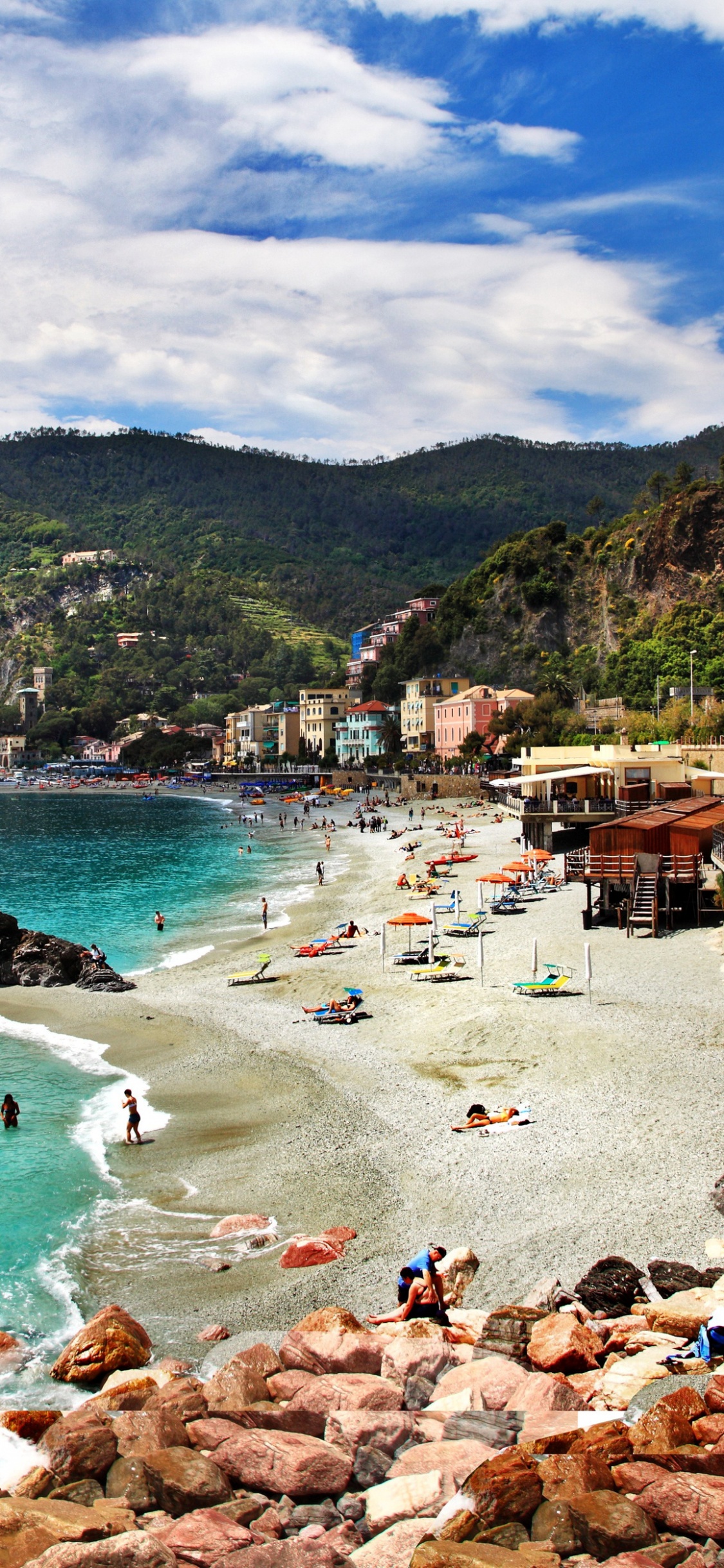 People on Beach During Daytime. Wallpaper in 1125x2436 Resolution