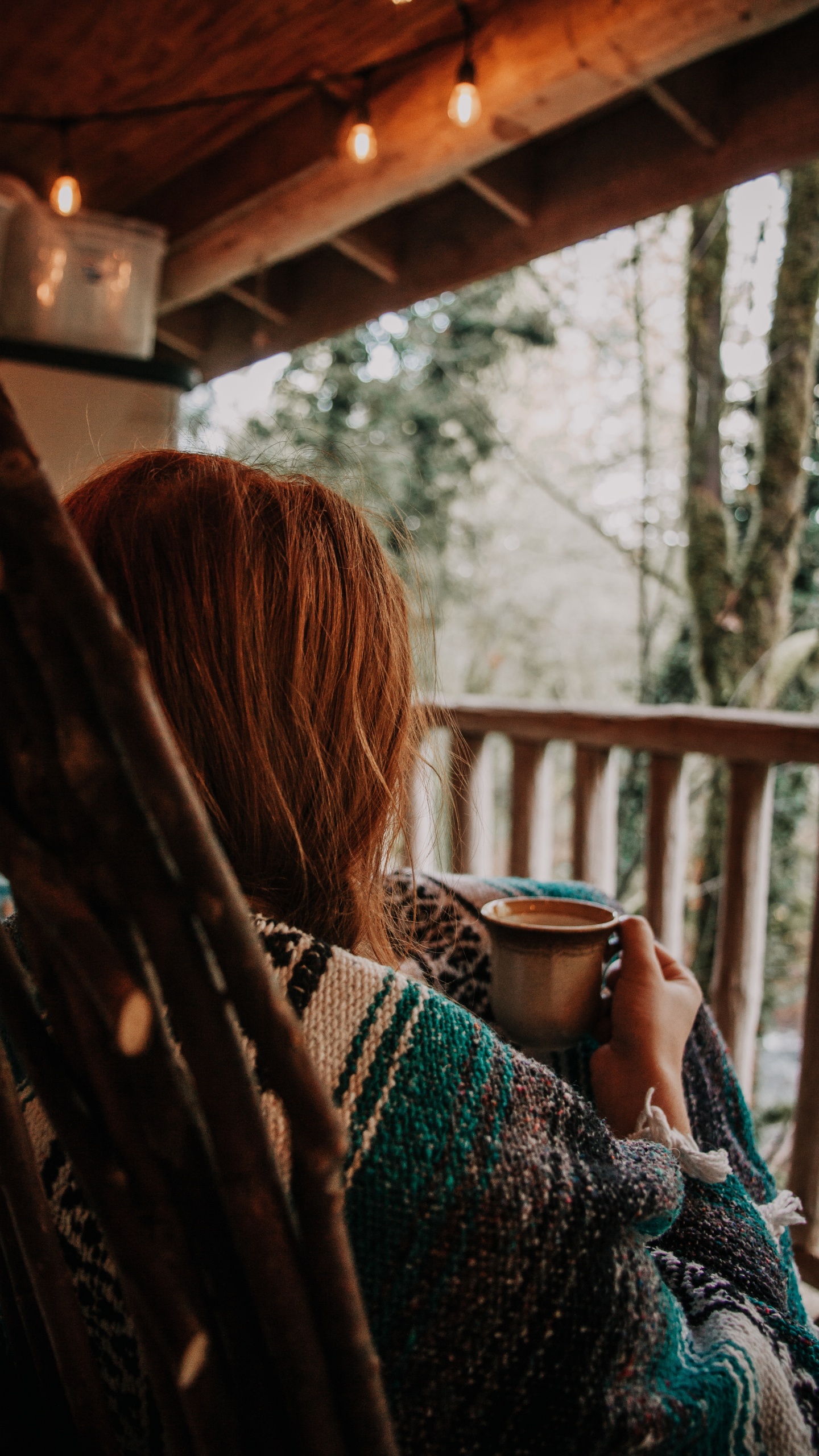 Woman in Black and White Knit Sweater Holding Blue Ceramic Mug. Wallpaper in 1440x2560 Resolution