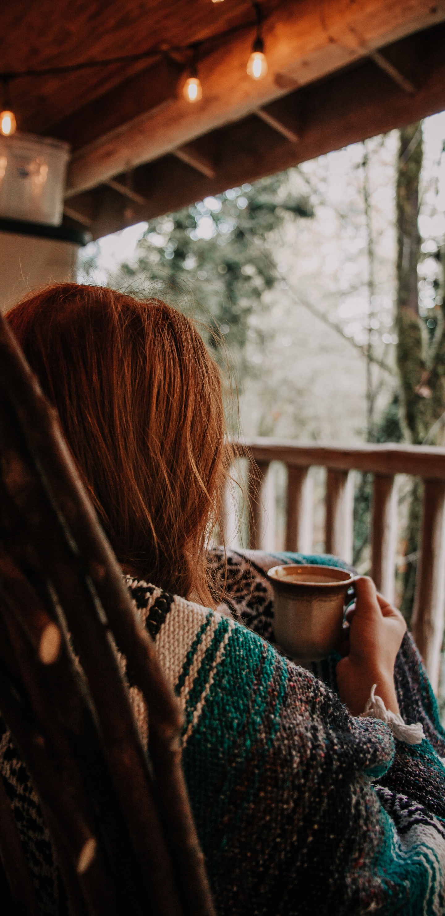 Woman in Black and White Knit Sweater Holding Blue Ceramic Mug. Wallpaper in 1440x2960 Resolution