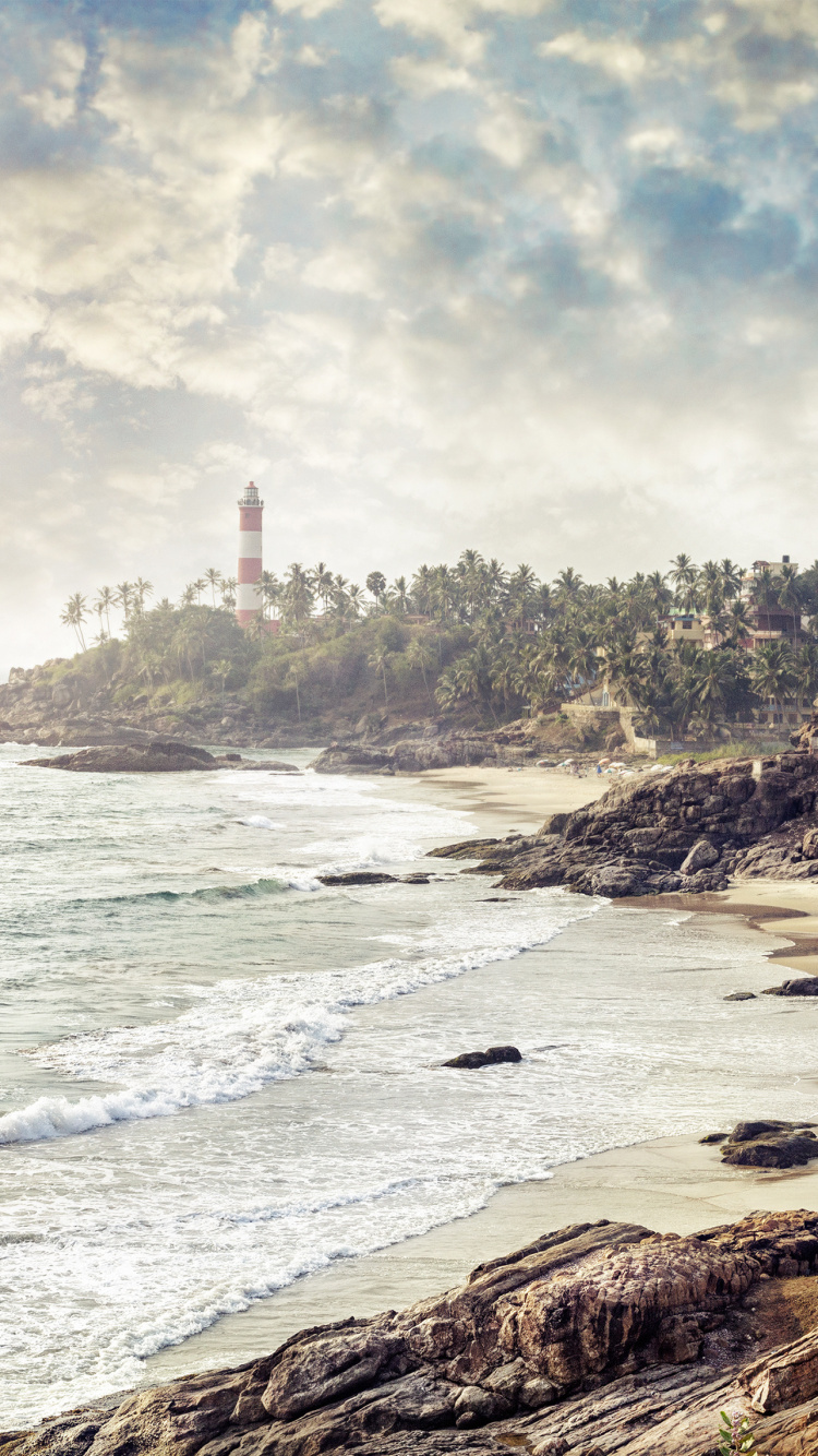 Brown Rock Formation on Sea Shore During Daytime. Wallpaper in 750x1334 Resolution