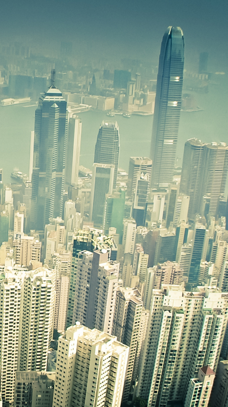 Vista Aérea de Los Edificios de la Ciudad Durante el Día.. Wallpaper in 750x1334 Resolution