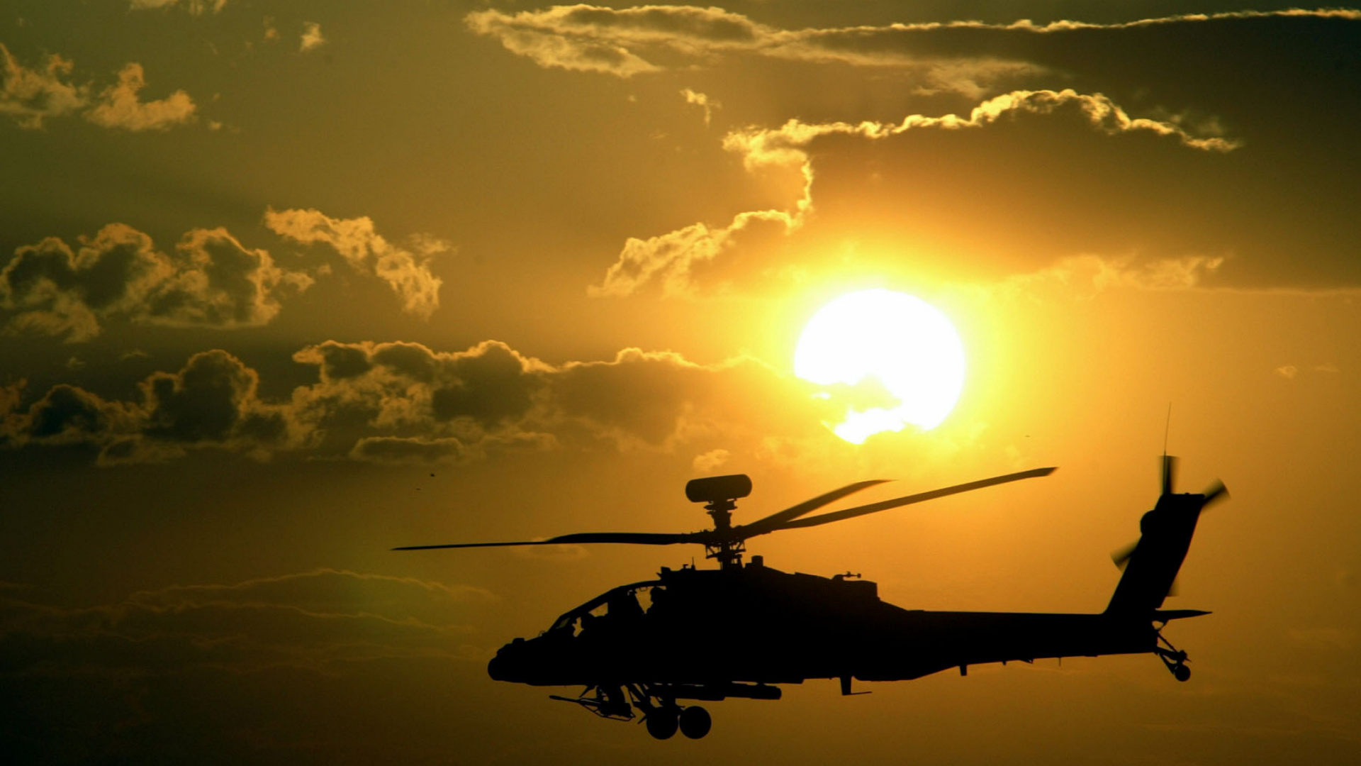 Silhouette of Man Riding Helicopter Under Cloudy Sky During Sunset. Wallpaper in 1920x1080 Resolution