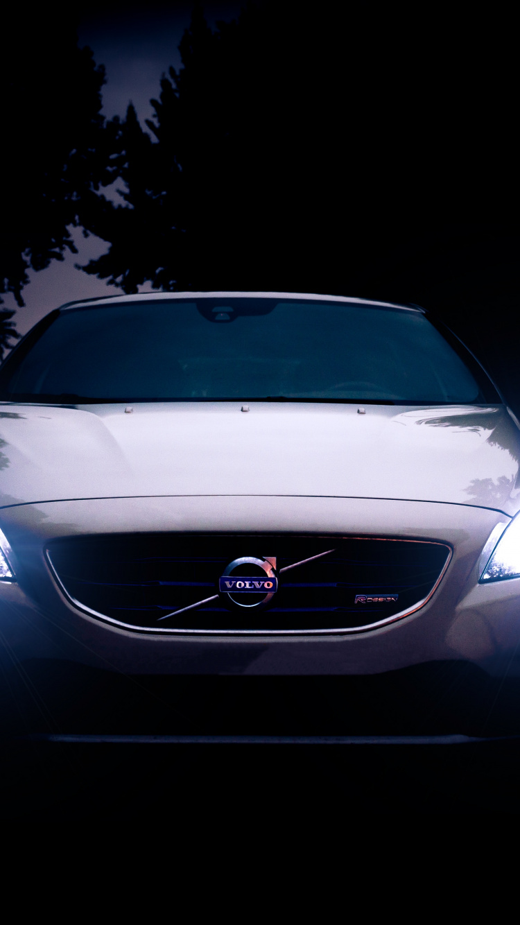 White Car With Light Turned on During Night Time. Wallpaper in 750x1334 Resolution