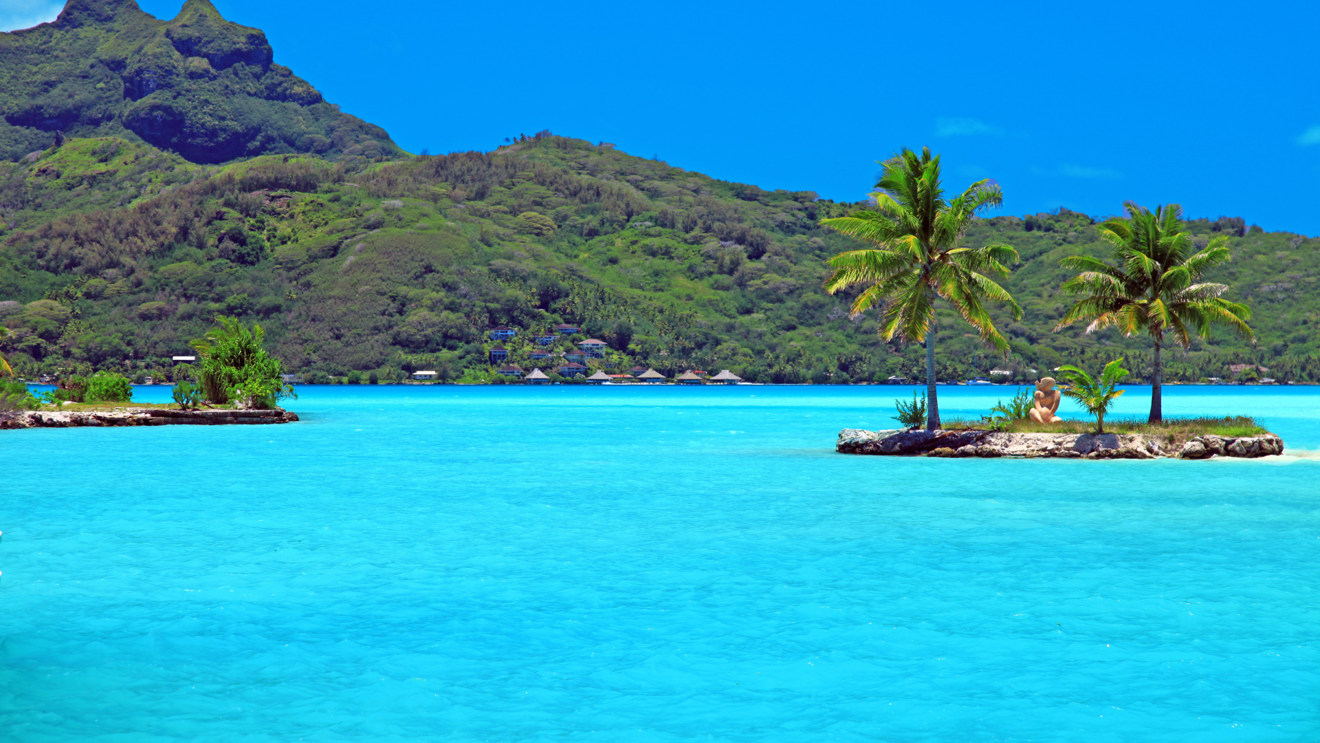 People Riding on Boat on Sea Near Green Mountain Under Blue Sky During Daytime. Wallpaper in 1920x1080 Resolution