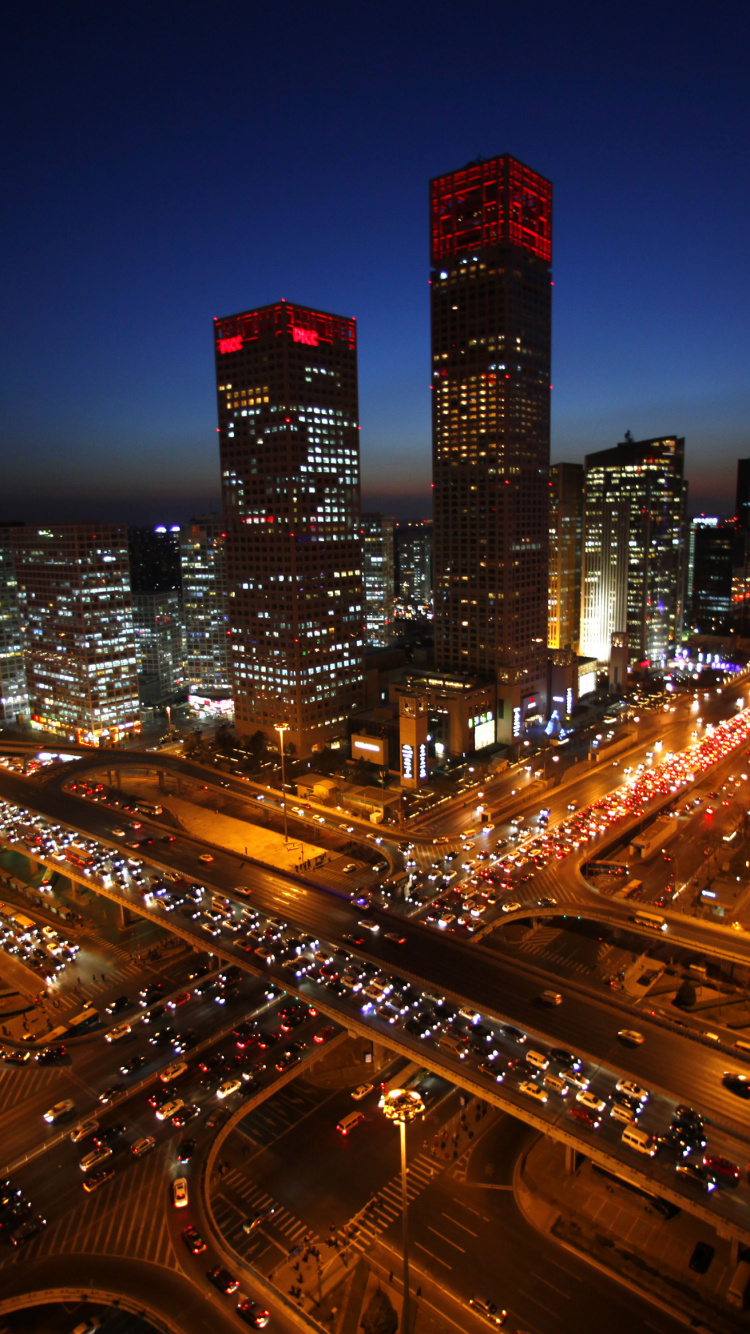 City Buildings During Night Time. Wallpaper in 750x1334 Resolution