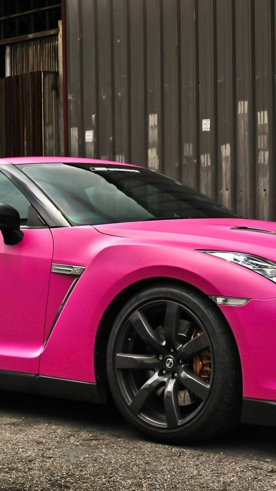 Pink Car Parked Near Brown Wooden Wall. Wallpaper in 1080x1920 Resolution