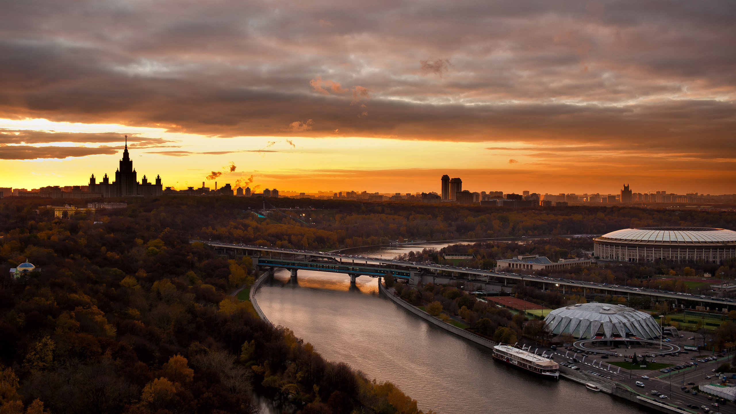 Aerial View of City During Sunset. Wallpaper in 2560x1440 Resolution