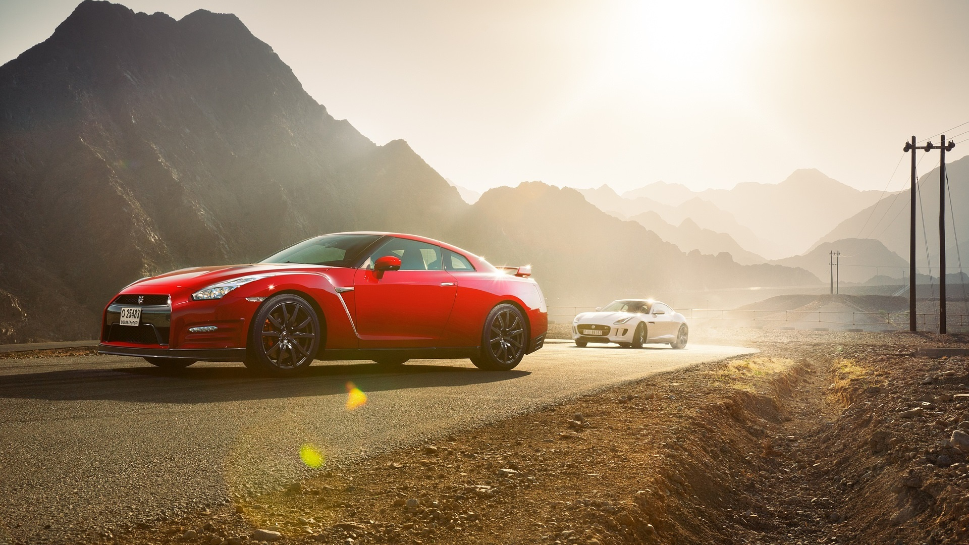 Coupé Ferrari Rouge Sur le Sable Brun Pendant la Journée. Wallpaper in 1920x1080 Resolution