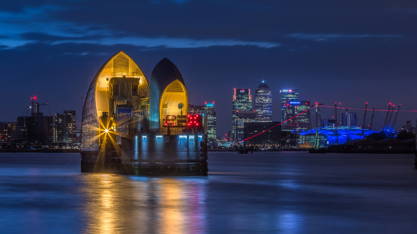 White and Black Building Near Body of Water During Night Time. Wallpaper in 1366x768 Resolution