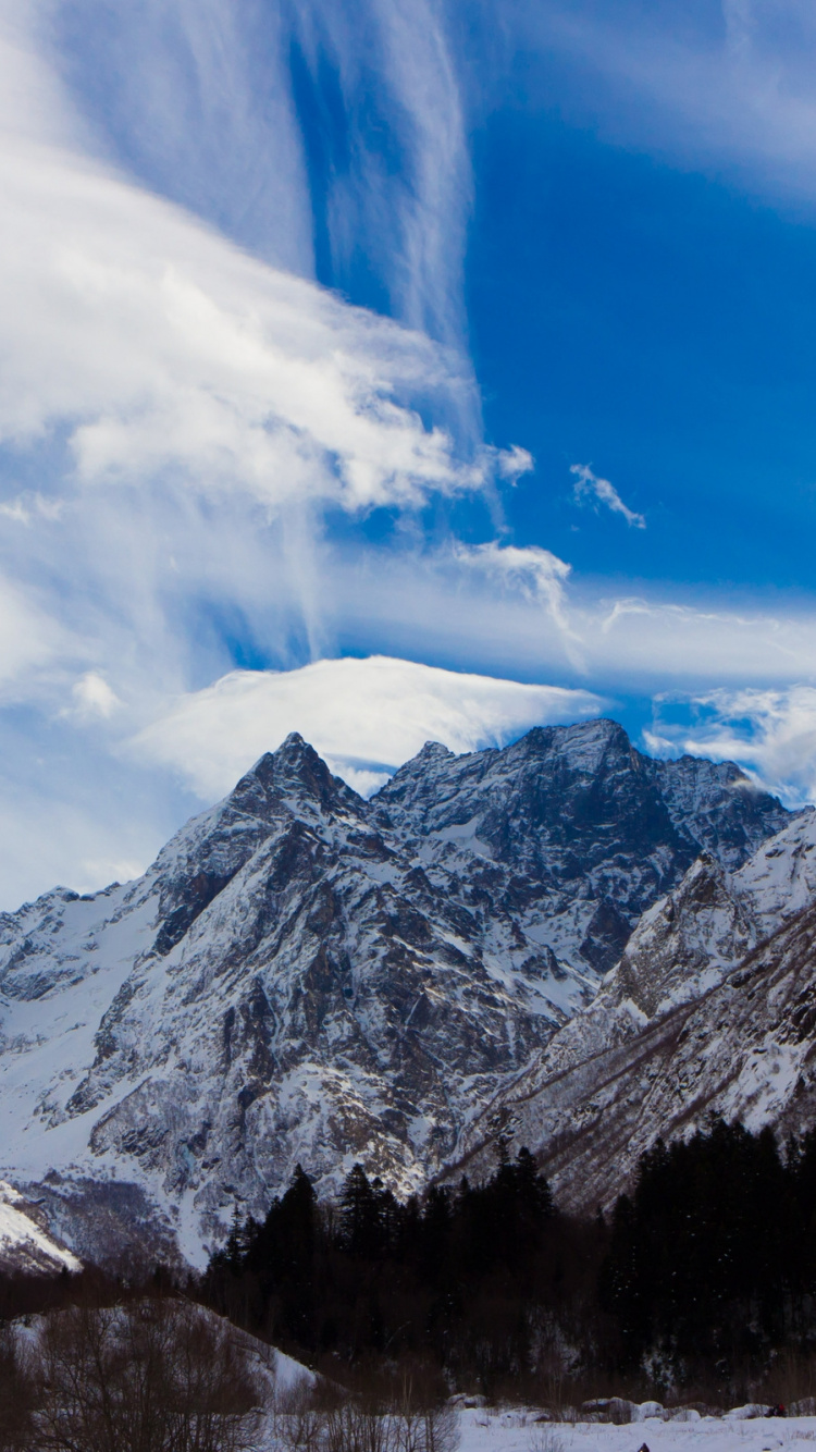 Montagne Couverte de Neige Sous Ciel Bleu Pendant la Journée. Wallpaper in 750x1334 Resolution