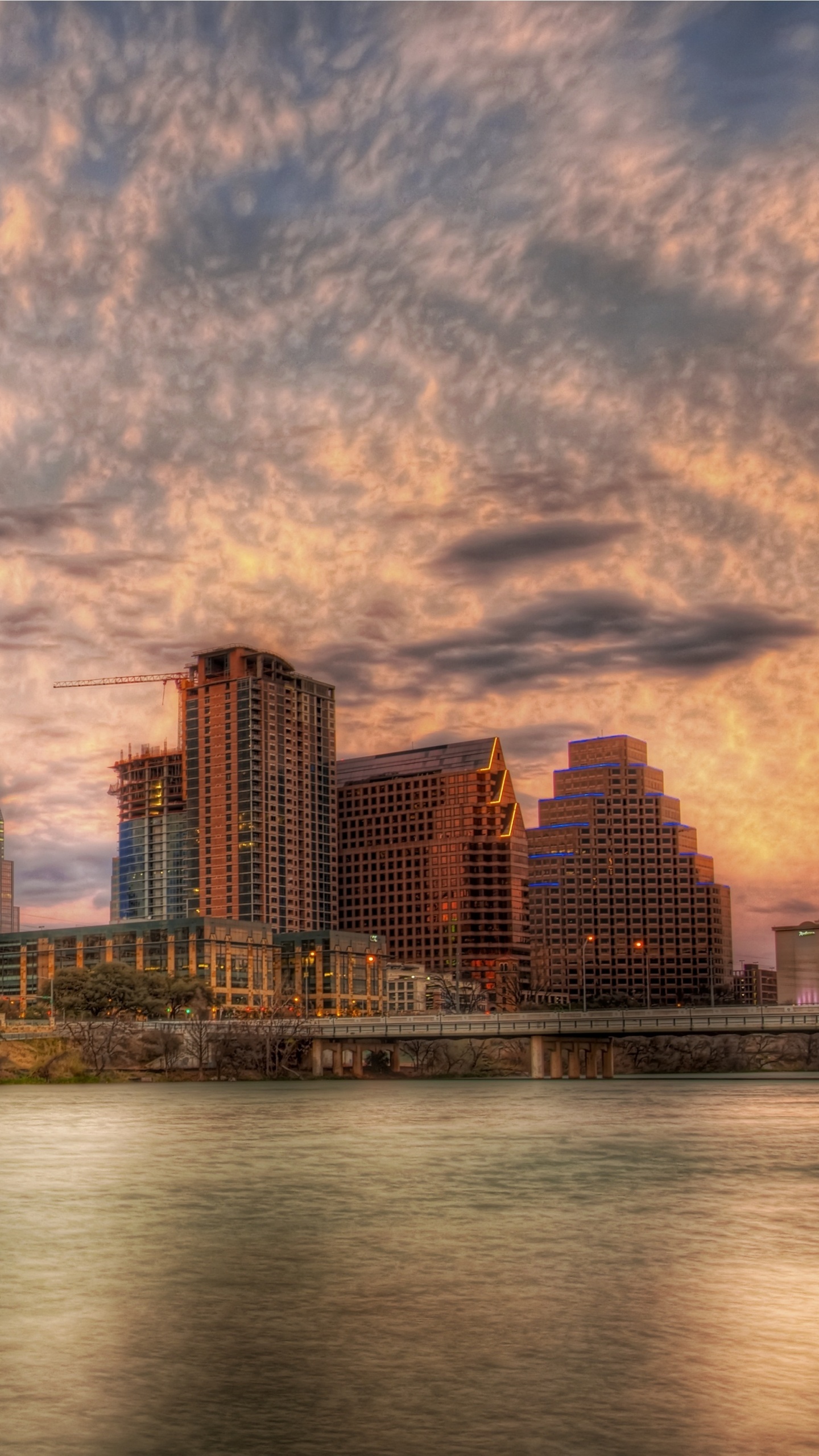 City Skyline Under Cloudy Sky During Daytime. Wallpaper in 1440x2560 Resolution