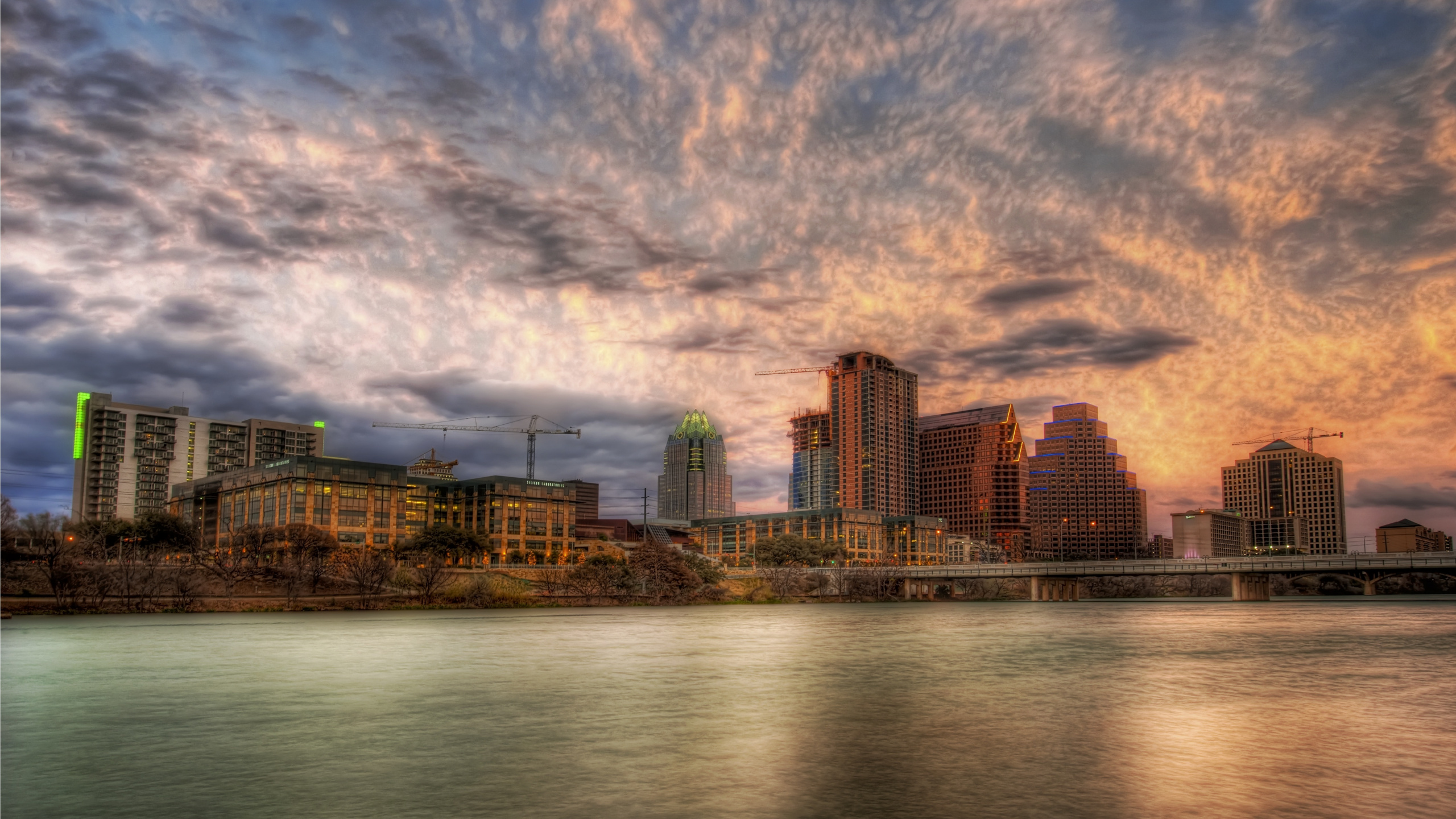 City Skyline Under Cloudy Sky During Daytime. Wallpaper in 2560x1440 Resolution