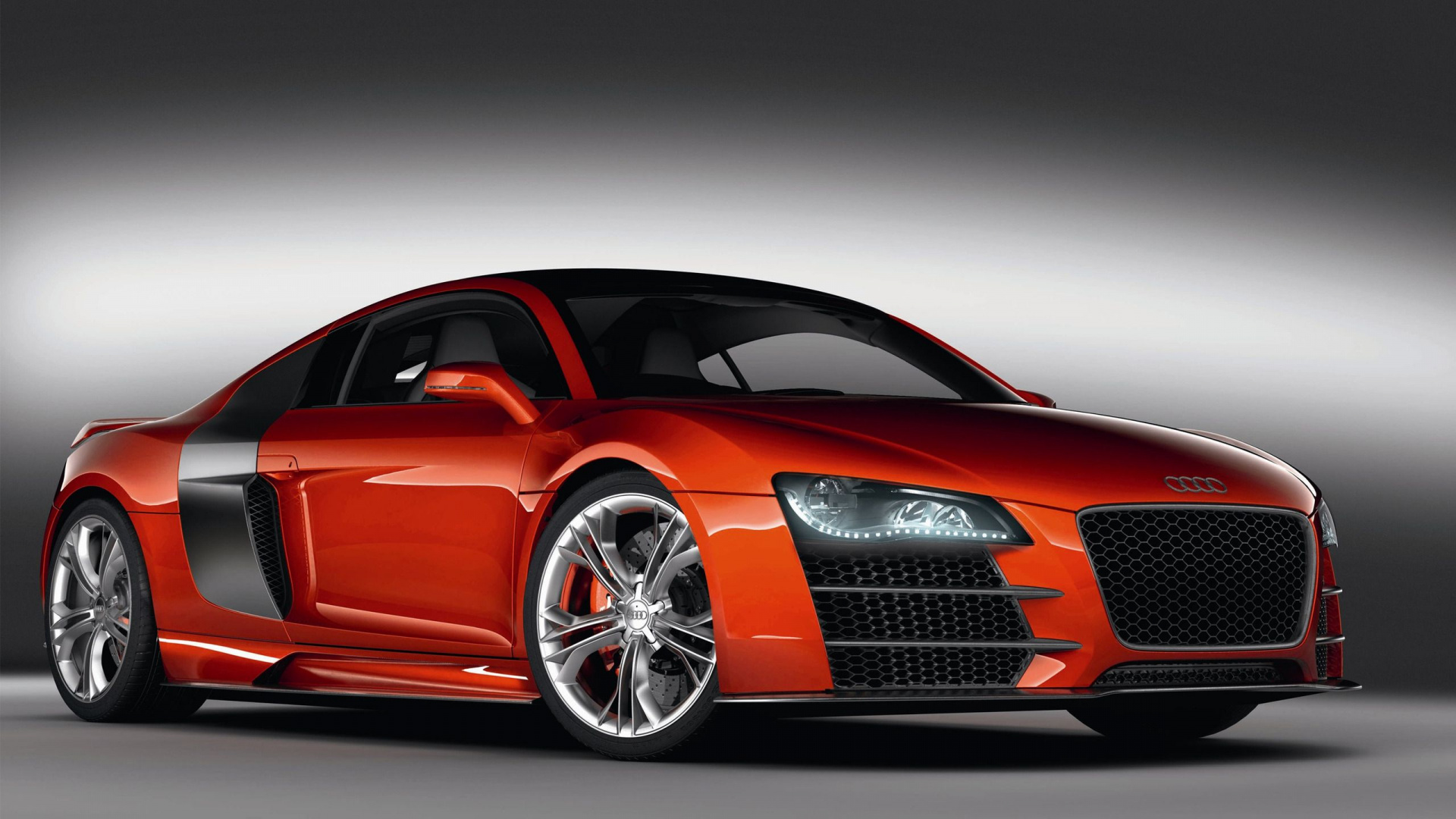 Coupé Audi Rouge Dans Une Salle Blanche. Wallpaper in 1920x1080 Resolution