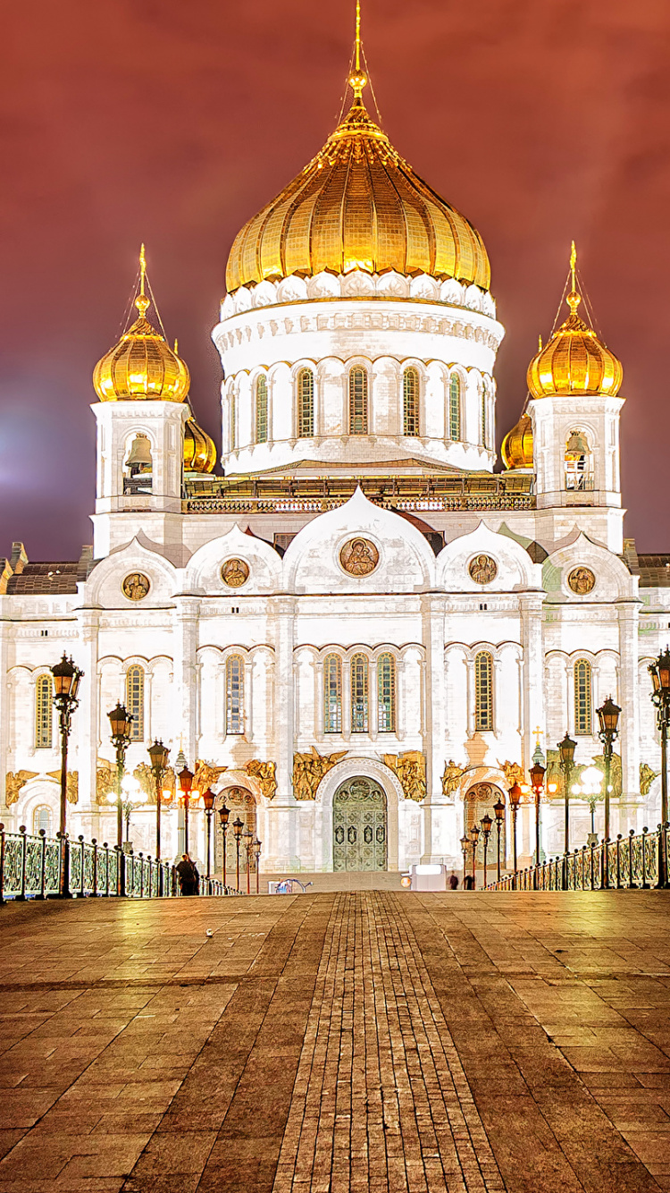 White and Brown Concrete Building During Night Time. Wallpaper in 750x1334 Resolution