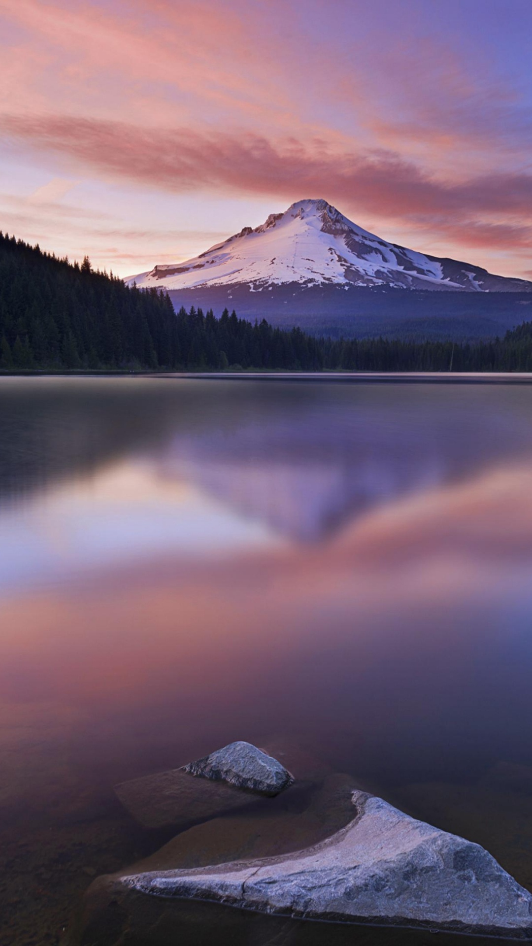 Lake Near Mountain Under Orange Sky. Wallpaper in 1080x1920 Resolution