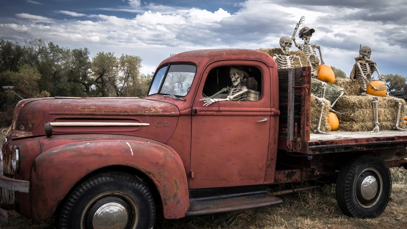 Red Single Cab Pickup Truck on Green Grass Field During Daytime. Wallpaper in 1366x768 Resolution