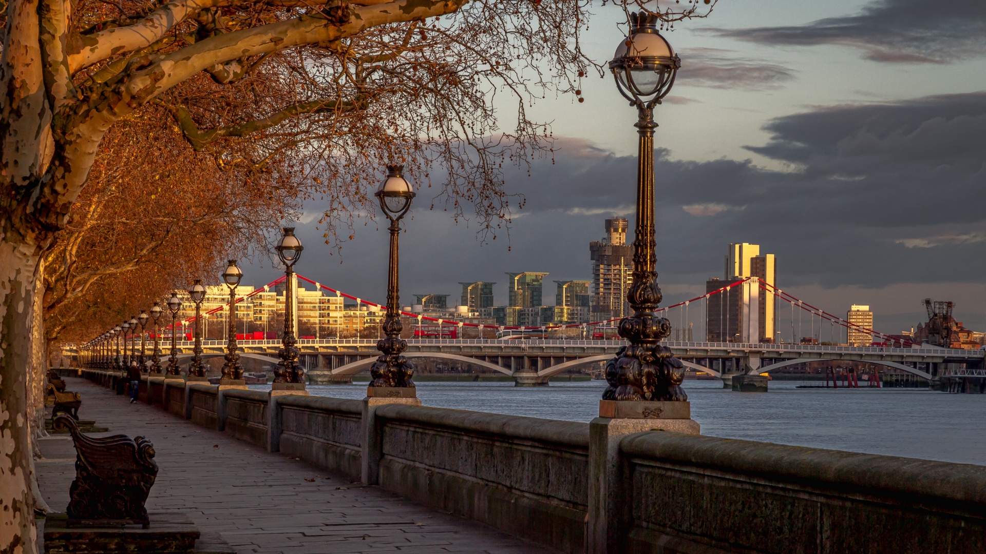 Black Street Lamp Near Body of Water During Sunset. Wallpaper in 1920x1080 Resolution