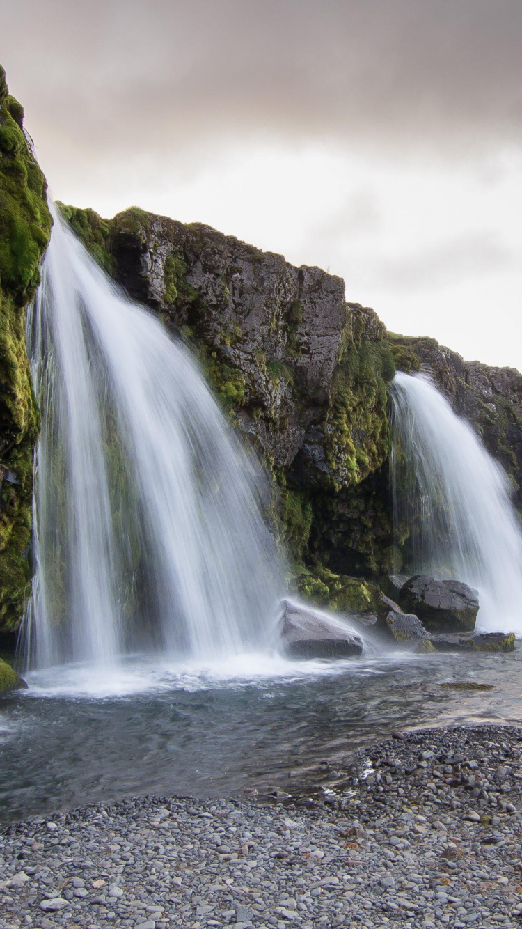 Waterfalls Near Green and Brown Mountain Under White Clouds During Daytime. Wallpaper in 750x1334 Resolution