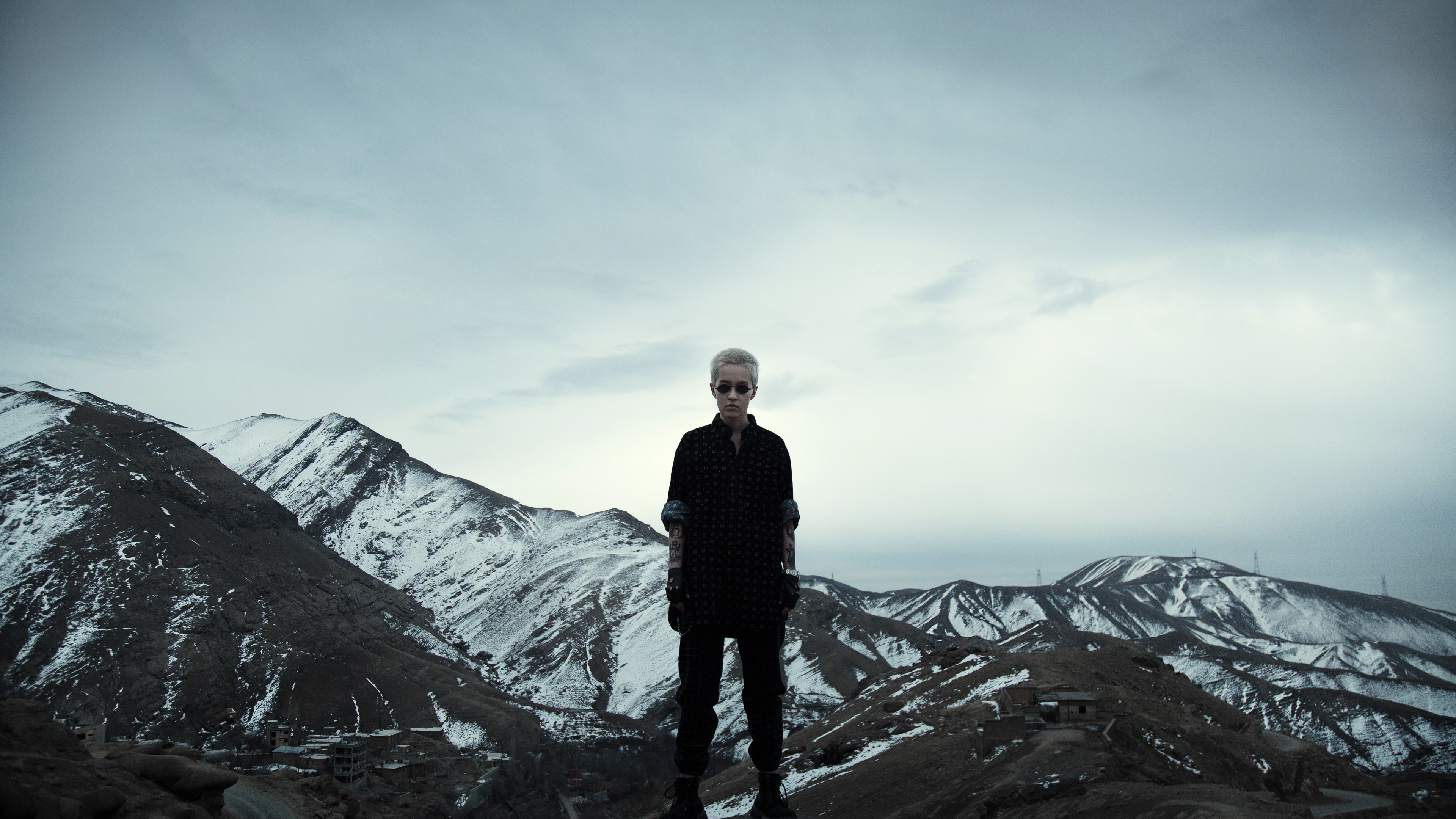 Man in Black Jacket Standing on Rock Formation During Daytime. Wallpaper in 3840x2160 Resolution