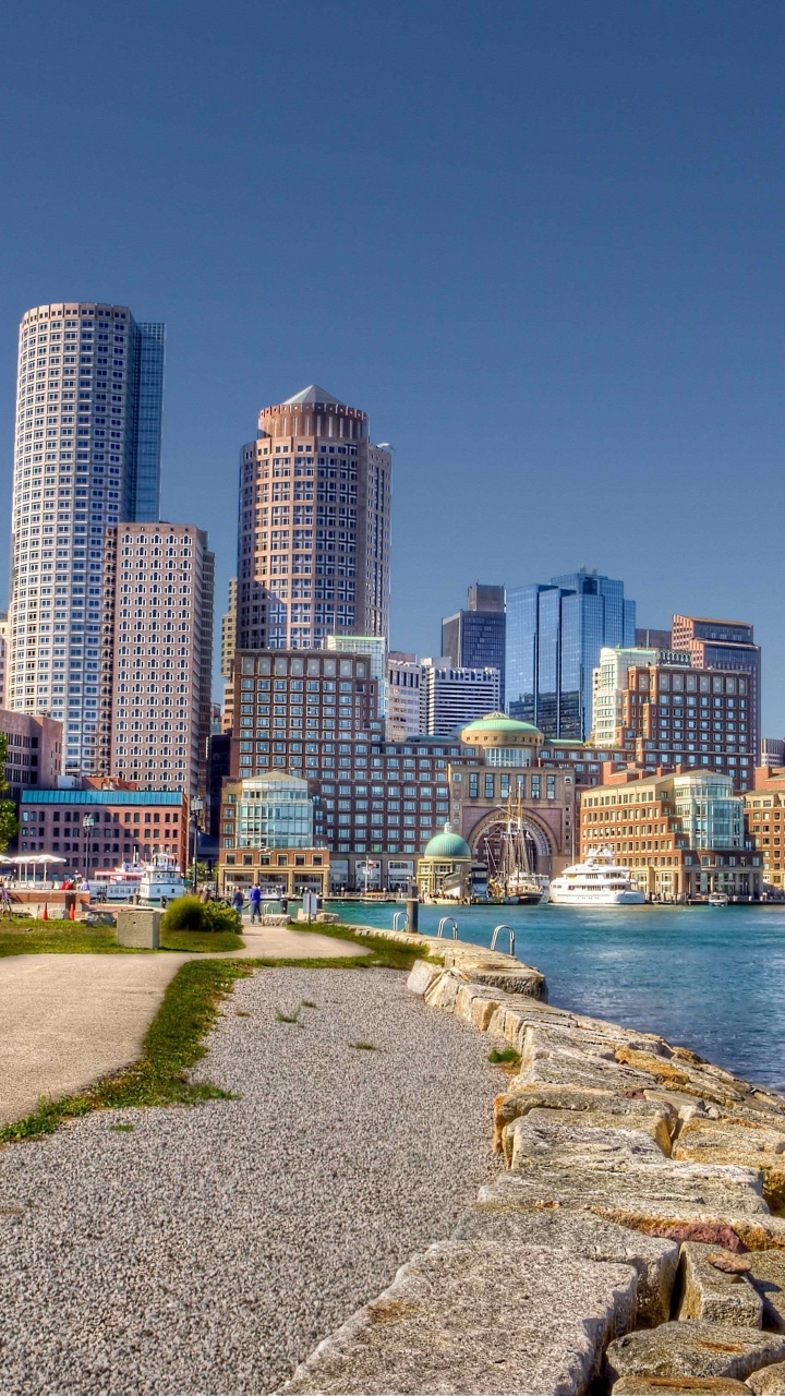 City Skyline Near Body of Water During Daytime. Wallpaper in 720x1280 Resolution