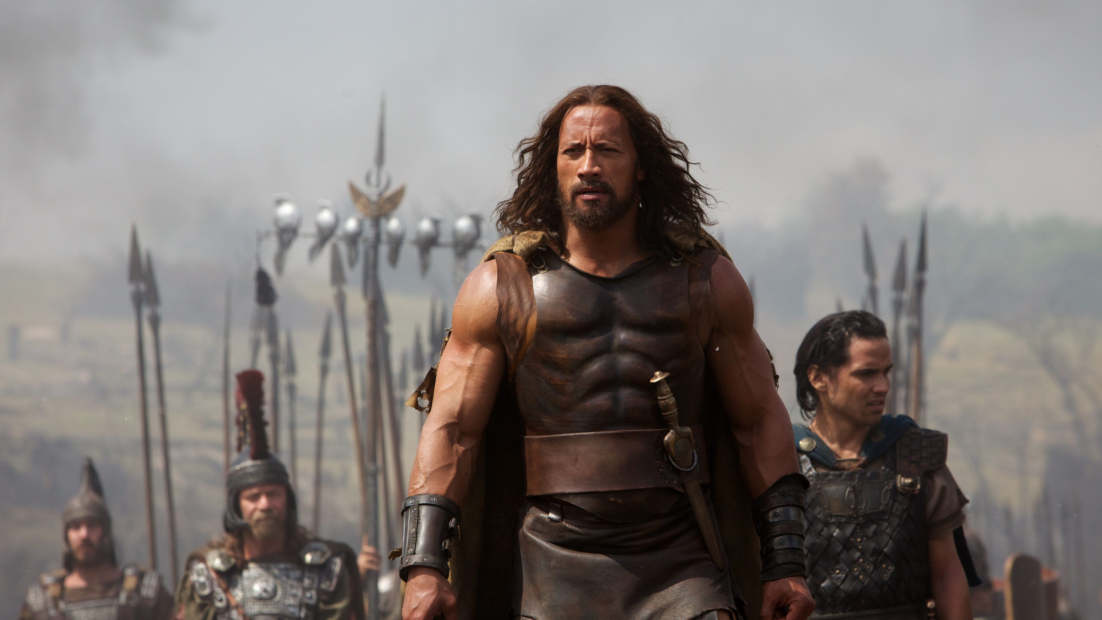 Woman in Brown Leather Jacket Standing on Field. Wallpaper in 3840x2160 Resolution