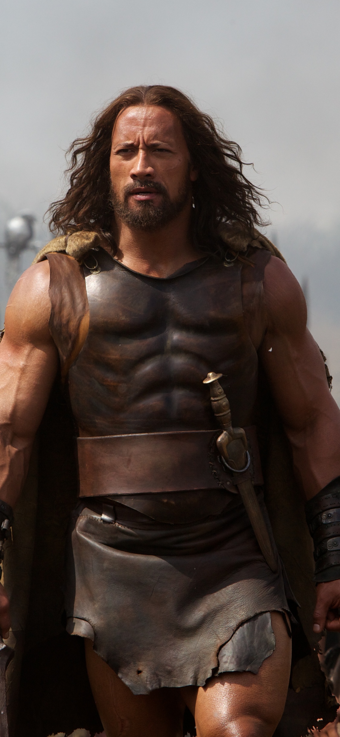 Femme en Blouson de Cuir Marron Debout Sur Terrain. Wallpaper in 1125x2436 Resolution