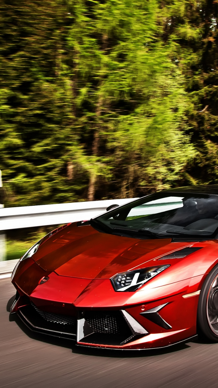 Red Ferrari 458 Italia on Road During Daytime. Wallpaper in 750x1334 Resolution