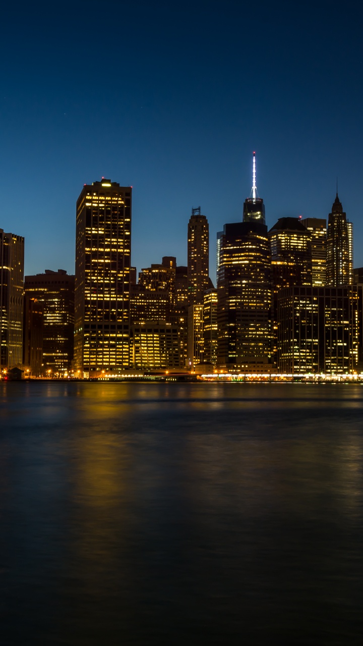City Skyline During Night Time. Wallpaper in 720x1280 Resolution