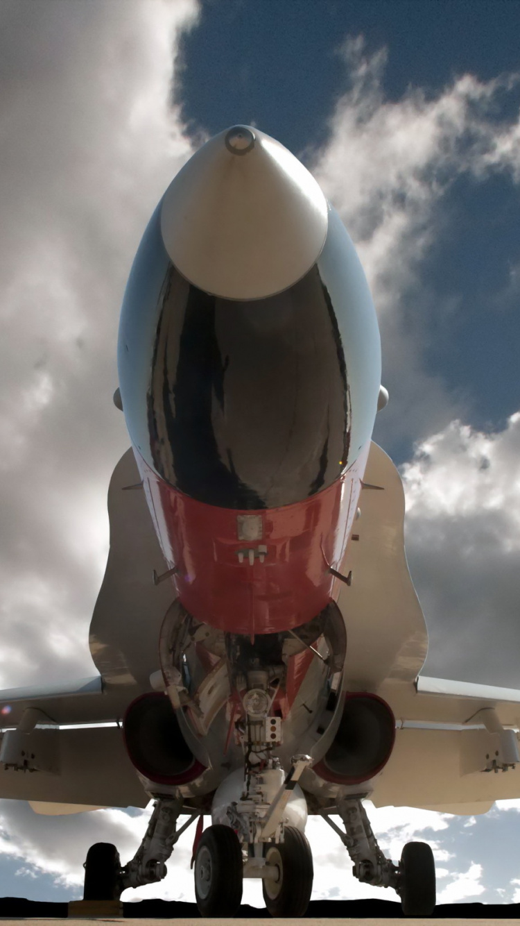 Red and White Airplane Under Blue Sky and White Clouds During Daytime. Wallpaper in 750x1334 Resolution