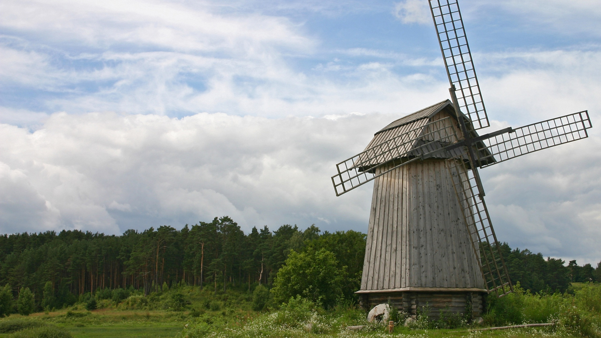 Brown Wooden House on Green Grass Field Under White Clouds During Daytime. Wallpaper in 1920x1080 Resolution