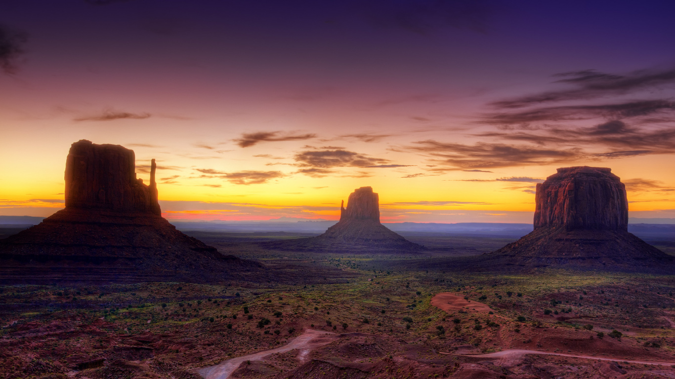 Brown Sand Near Green Mountain During Sunset. Wallpaper in 1366x768 Resolution